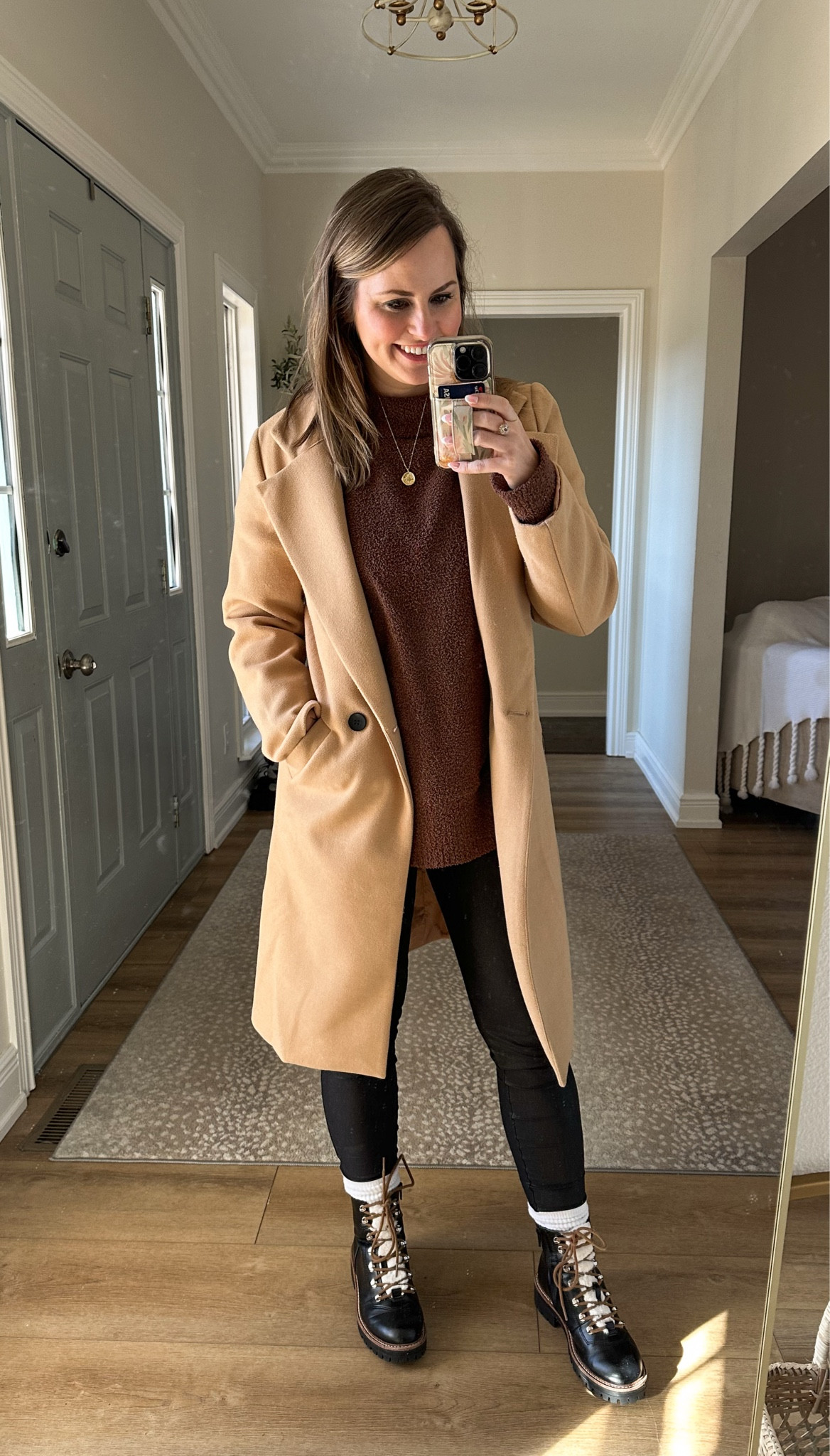 Elevated winter casual outfit! This long peacoat /wool coat is my most worn piece this winter. It’s the perfect layering piece over any outfit! Paired It here with my fuzzy (barefoot dreams feel alike) sweater and black faux leather leggings. Also, these target boots are some of my most worn this winter too! Very comfortable and I also have them in tan. 👌🏼 you will get a lot of use out of them! Wore my crew socks as my boots so today.  A trend that is very warm and comfy, I can get behind! 

#LTKFindsUnder50 #LTKStyleTip #LTKWatchNow