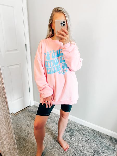 Oversized graphic sweatshirt 💖 It says “Fueled by iced coffee and anxiety” 😍 wearing a size small! Use code: BLONDEBELLE to save! 
.
.
.
Oversized sweatshirts, graphic sweatshirt, pink lily, biker shorts, casual summer outfit, casual everyday outfit, casual style, casual outfits, spring outfit, cozy style 

#LTKstyletip #LTKunder100 #LTKunder50