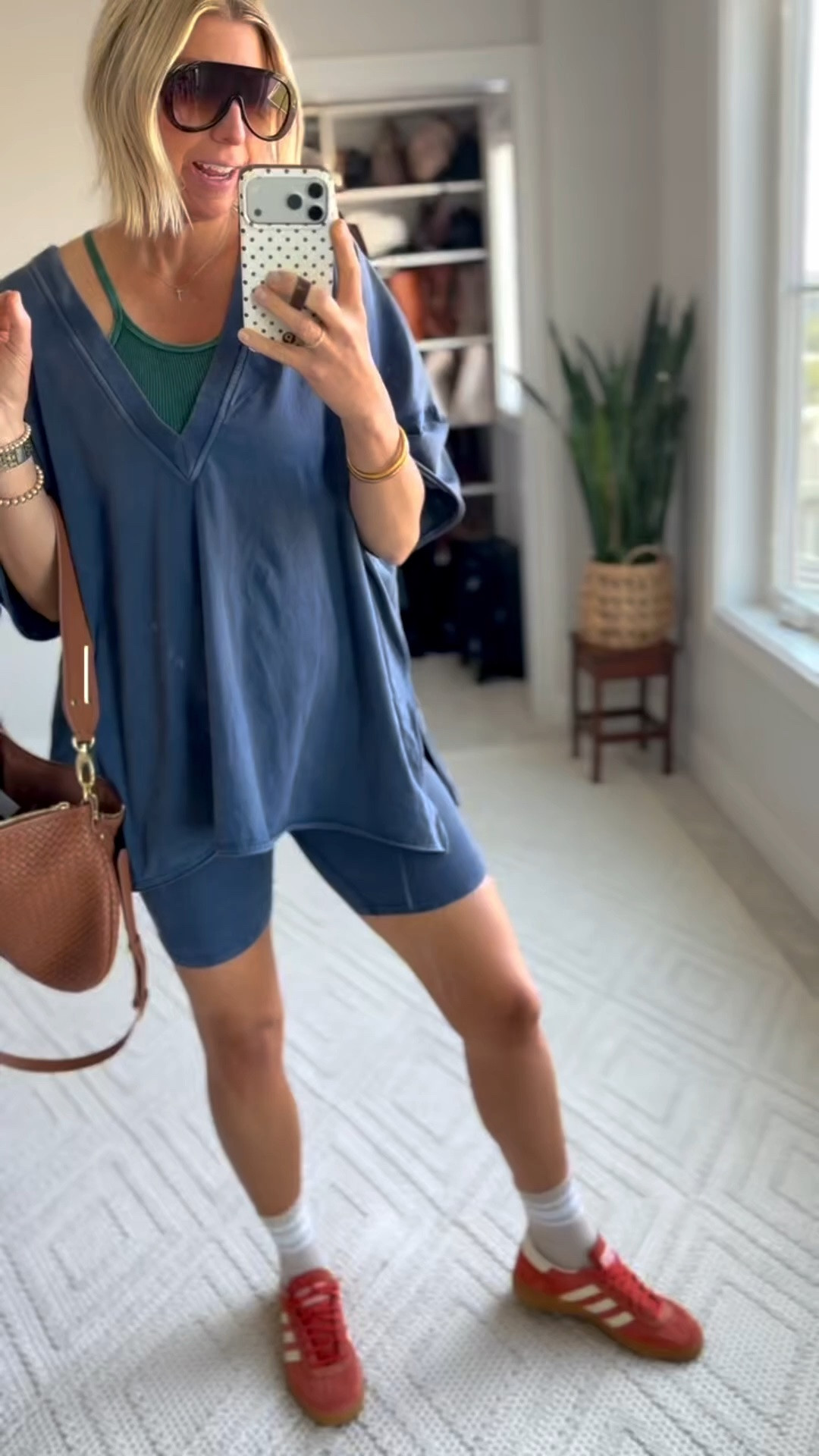 Real-life outfit: it’s hot, I have kid stuff all day, and I still want to feel like myself- I LOVE this cotton sporty matching set.

The reversible top runs very oversized. 
Get your true to size.
I’m wearing a medium to fit my growing, 20 weeks baby bump🥰