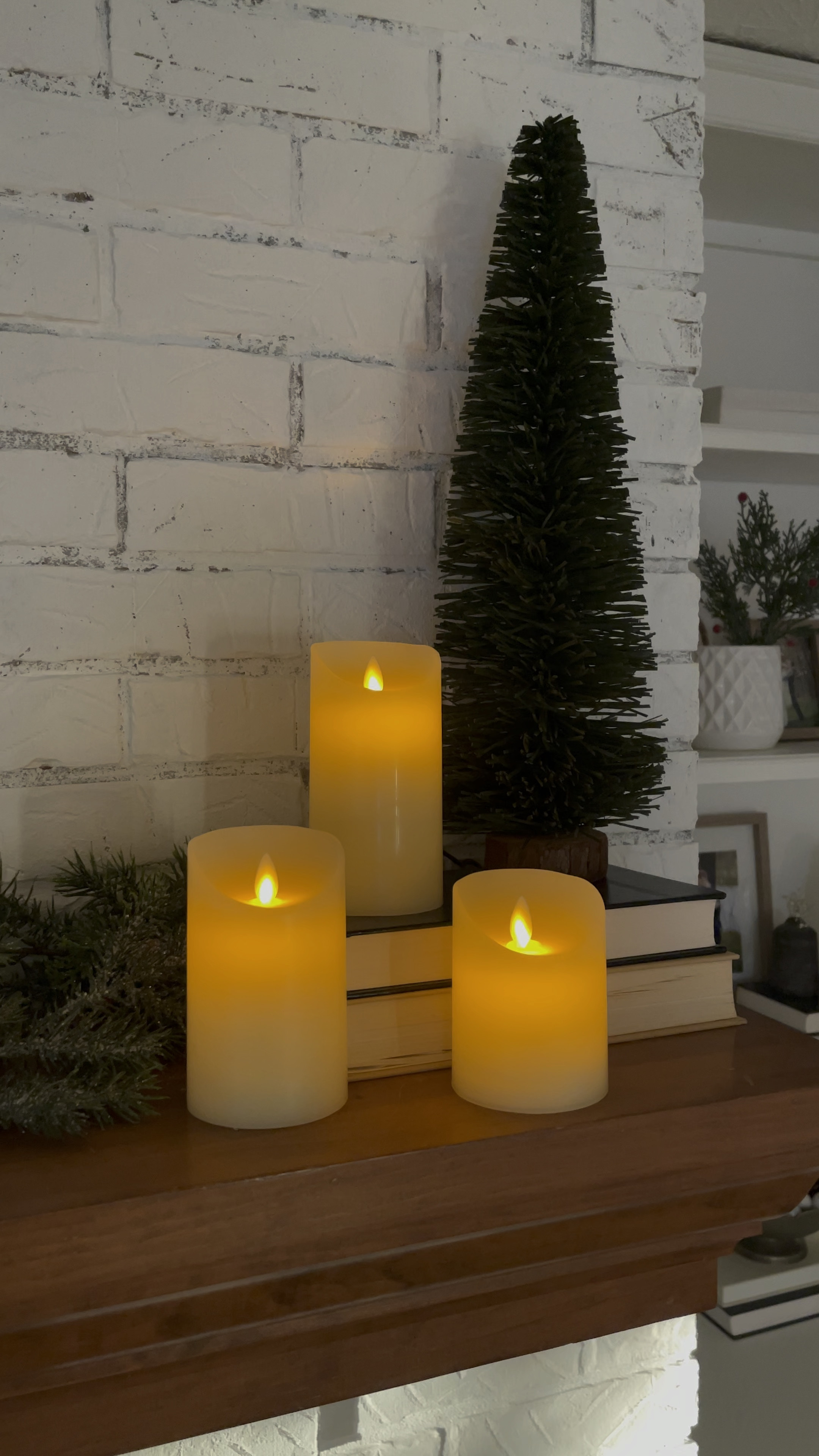 these flameless candles are such a dream 🕯️✨ comes with a remote to control brightness & the duration you want them going. winter/holiday decor staple for sure !!!

#LTKhome #LTKVideo #LTKHoliday