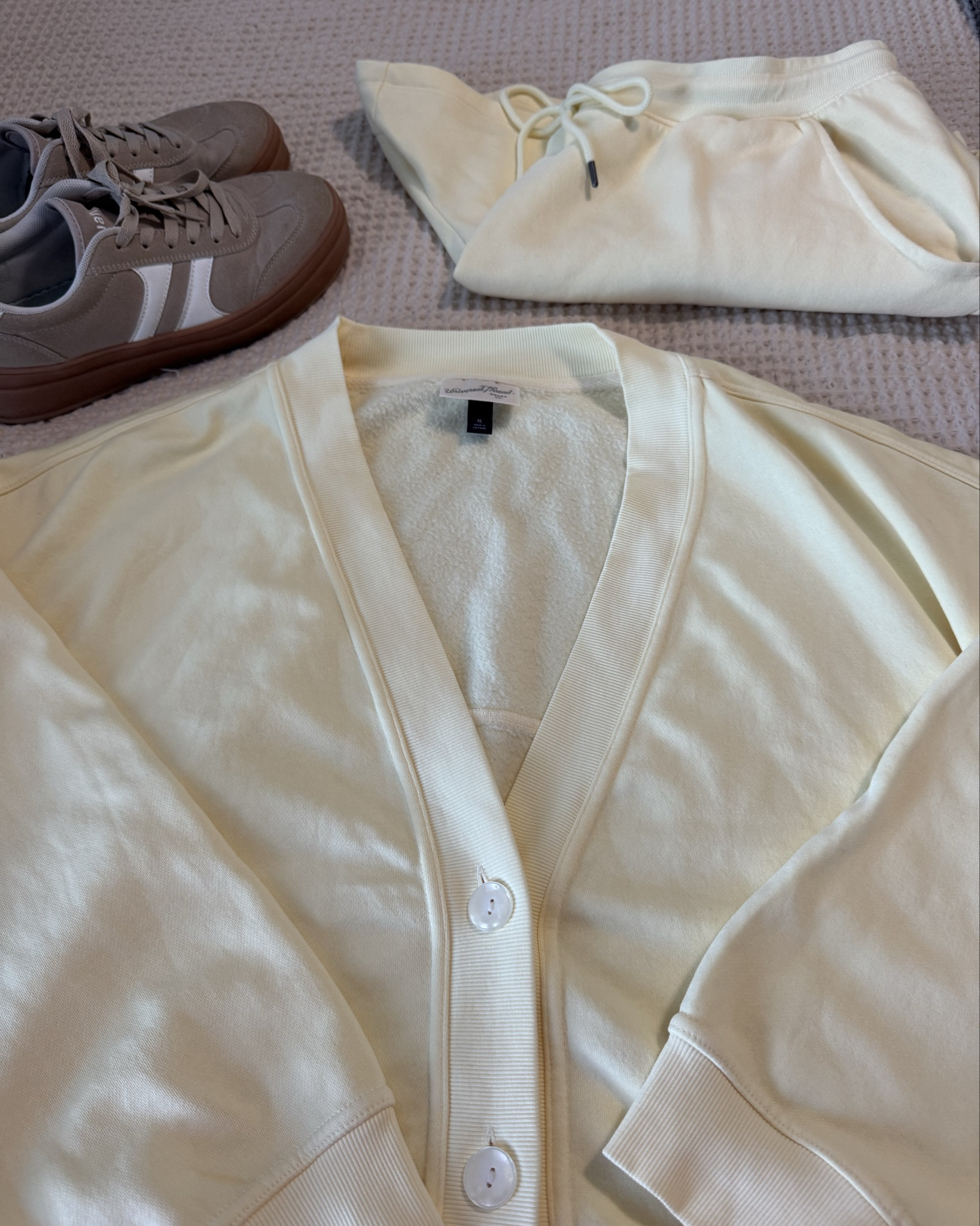 Obsessed with this beautiful butter yellow set! I’m wearing an XXL in the shorts and an xl in the cardigan! So soft and comfy! Finished the look with amazon sneakers! 

#LTKMidsize #LTKootd #LTKPlusSize