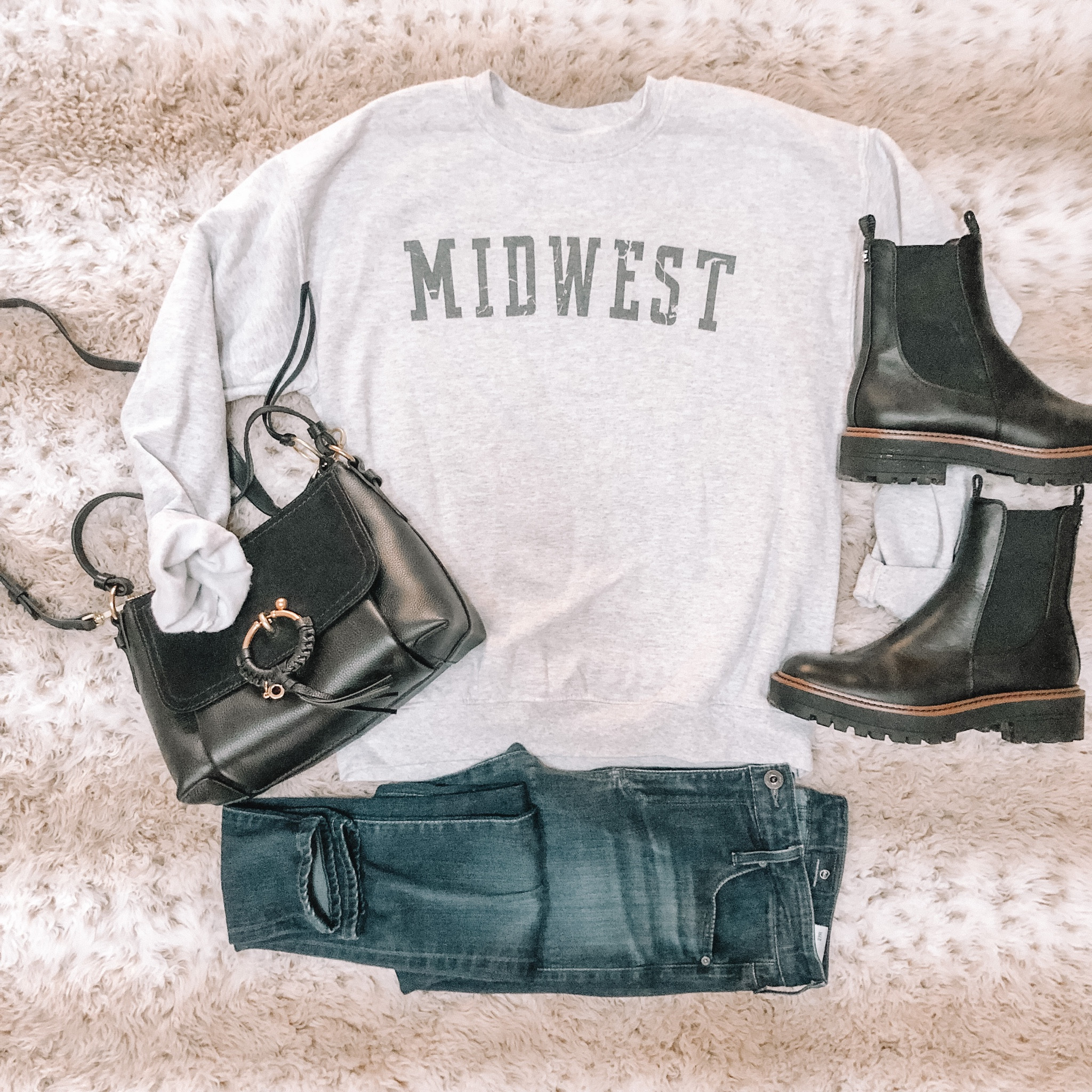 Midwest is home but boy is it cold this week! Anyone experiencing the winter blues? The lack of sunshine and cold weather does not suit me! The one good thing about winter though is that I get to wear my crewnecks everyday! Outfit deets-


#LTKSeasonal