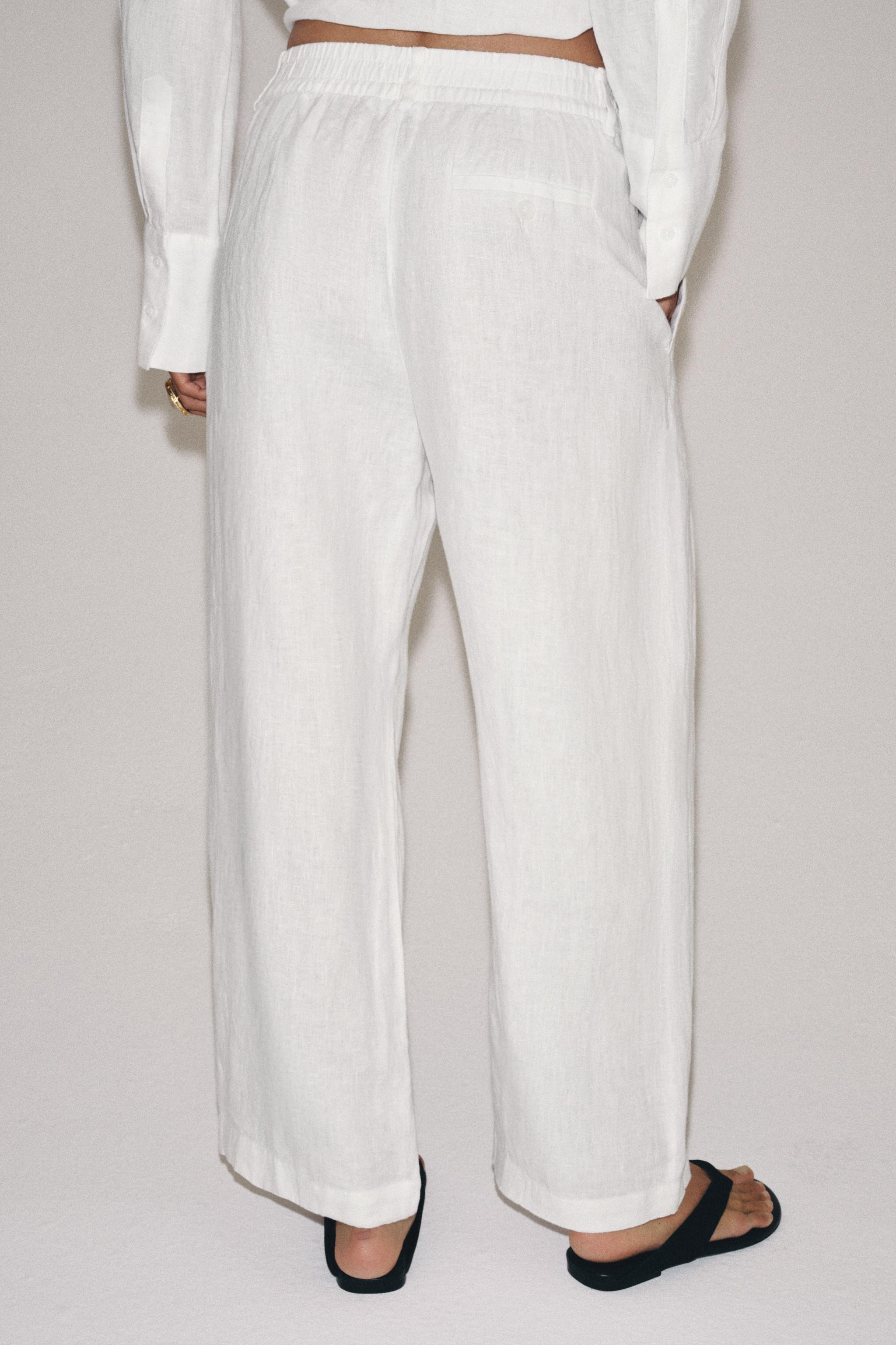 Gr\u00f6\u00dfe des Models: 178 cmZARA WOMAN COLLECTIONHose aus 100 % Leinengarn. Mittelhoher Bun... | Zara DE