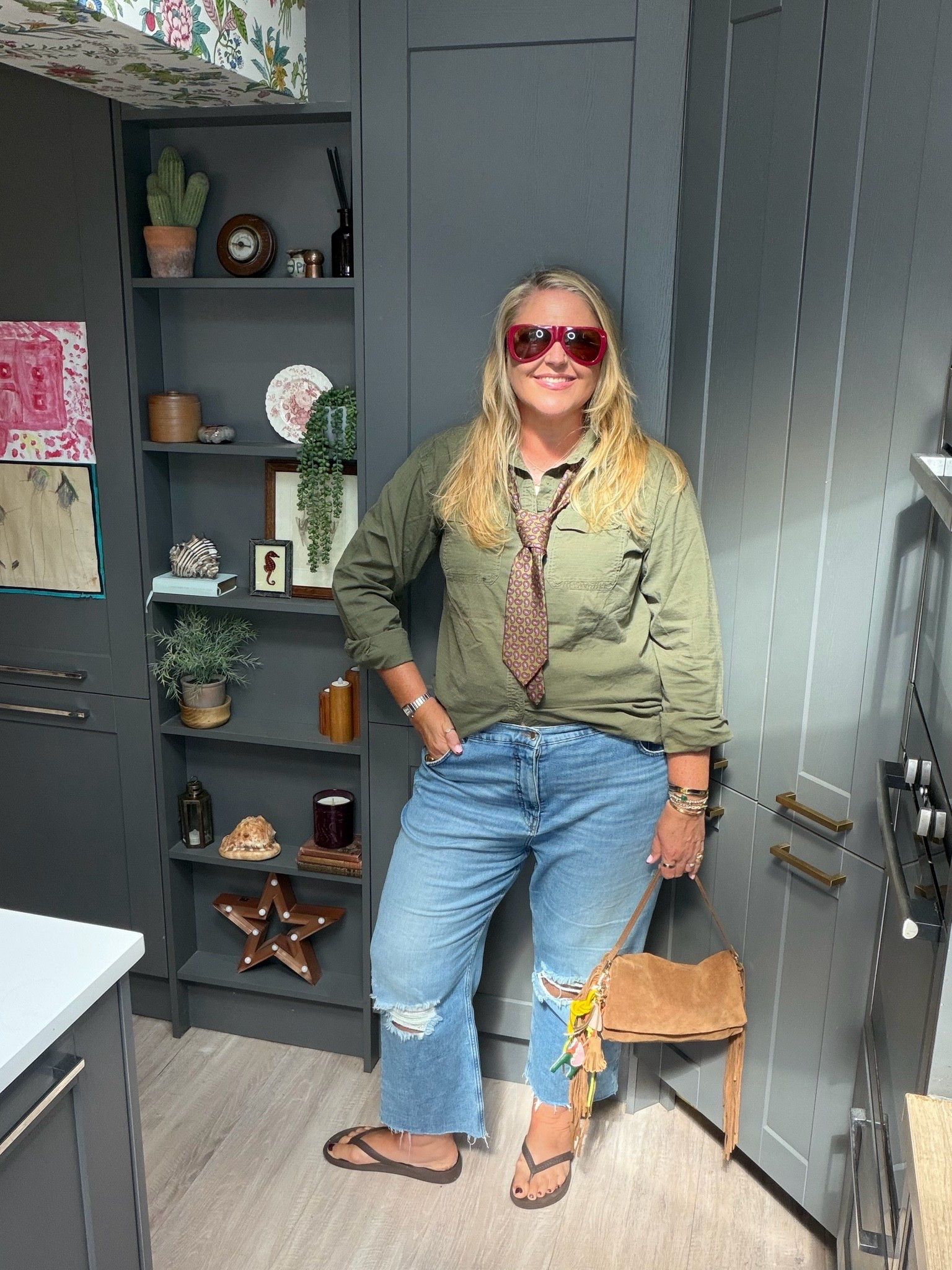 Khaki shirt, ripped jeans, fringe bag, tie, sunglasses, flip flops

#LTKjeans #LTKplussize #LTKautumn