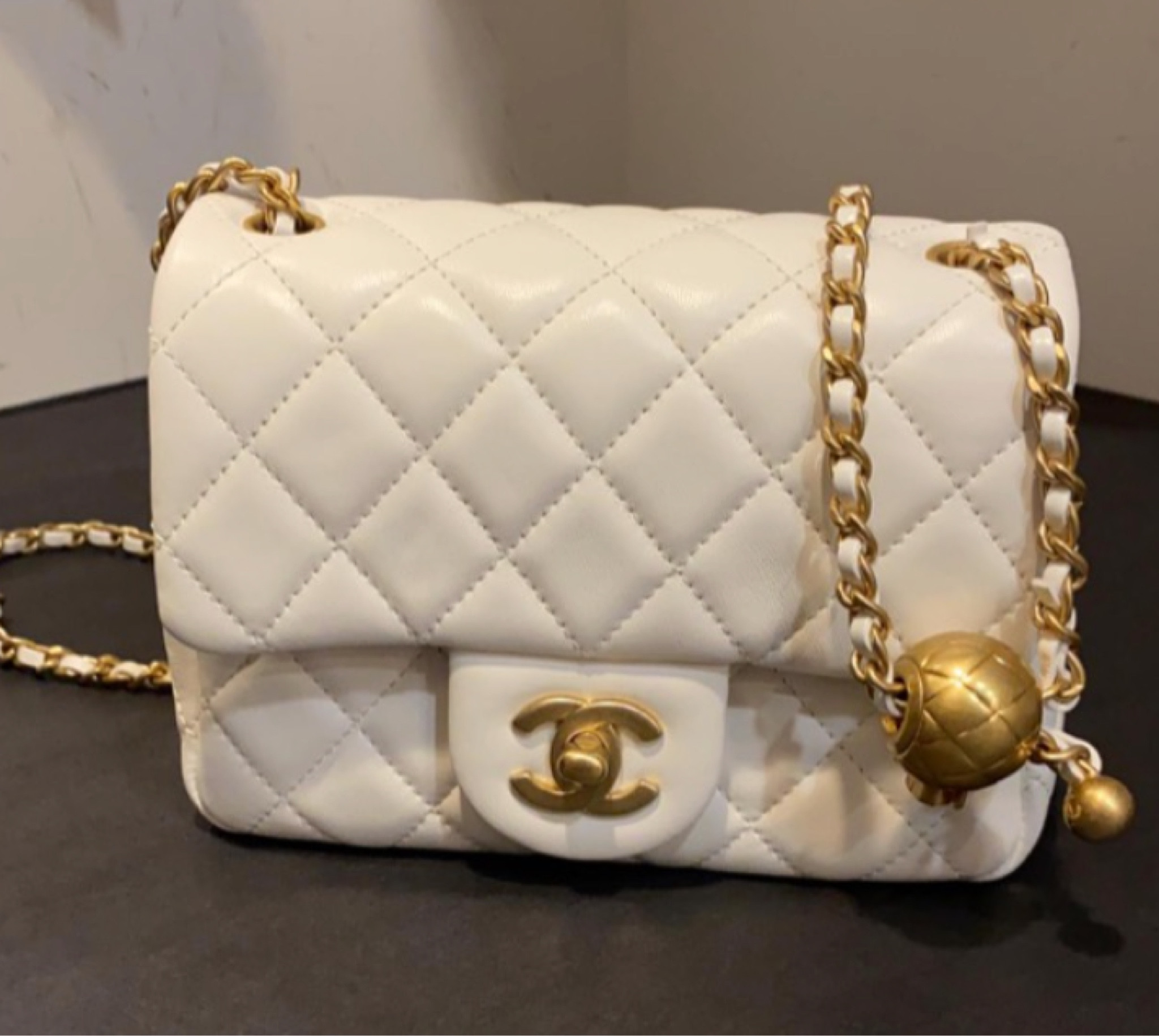 Chanel with ball on chain 🤍 $84 https://bit.ly/3jpnscL #dhgate

#LTKSale #LTKunder100 #LTKitbag