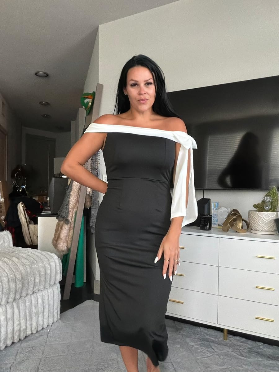 Turn heads in this elegant monochromatic midi dress. The off-the-shoulder white bow detail adds a touch of sophisticated glamour to a classic black silhouette, making it the perfect choice for a wedding guest or cocktail event. #ElegantStyle #MidiDress #CocktailAttire 

 #LTKHoliday #LTKdayinmylife #LTKootd