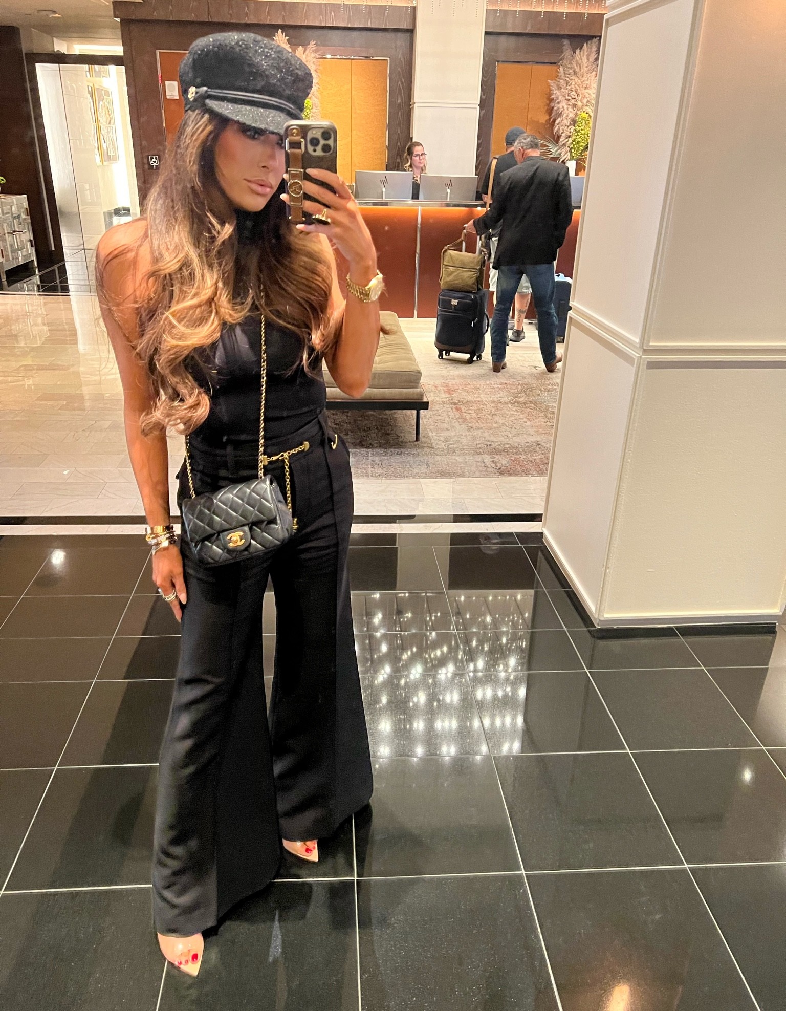 Emily Gemma, Fall Fashion, Quilted Crossbody, Chanel Crossbody Bag, Tory Burch Bag, Saint Laurent Bag, Wide Leg Trouser, Pleated Pants, HIgh Waisted Trousers, Fisherman Cap, Black Cap, Nude Heels, Nude Mules, Gianvito Rossi, Zimmermann, Good American, Emily Ann Gemma 