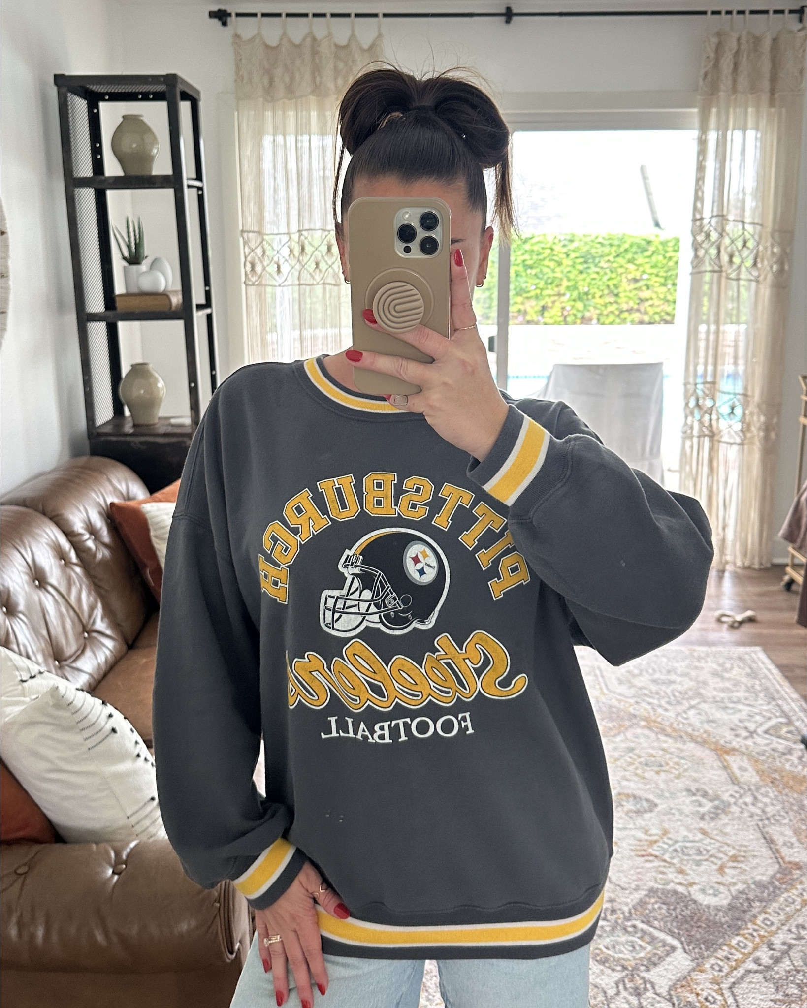 okkkkk, beyond obsessed w my new Steeler sweatshirt! Available in 26 other NFL teams as well! This would be a great gift too! 🖤 wearing size small. 

#LTKFindsUnder100 #LTKmomlife #LTKGiftGuide