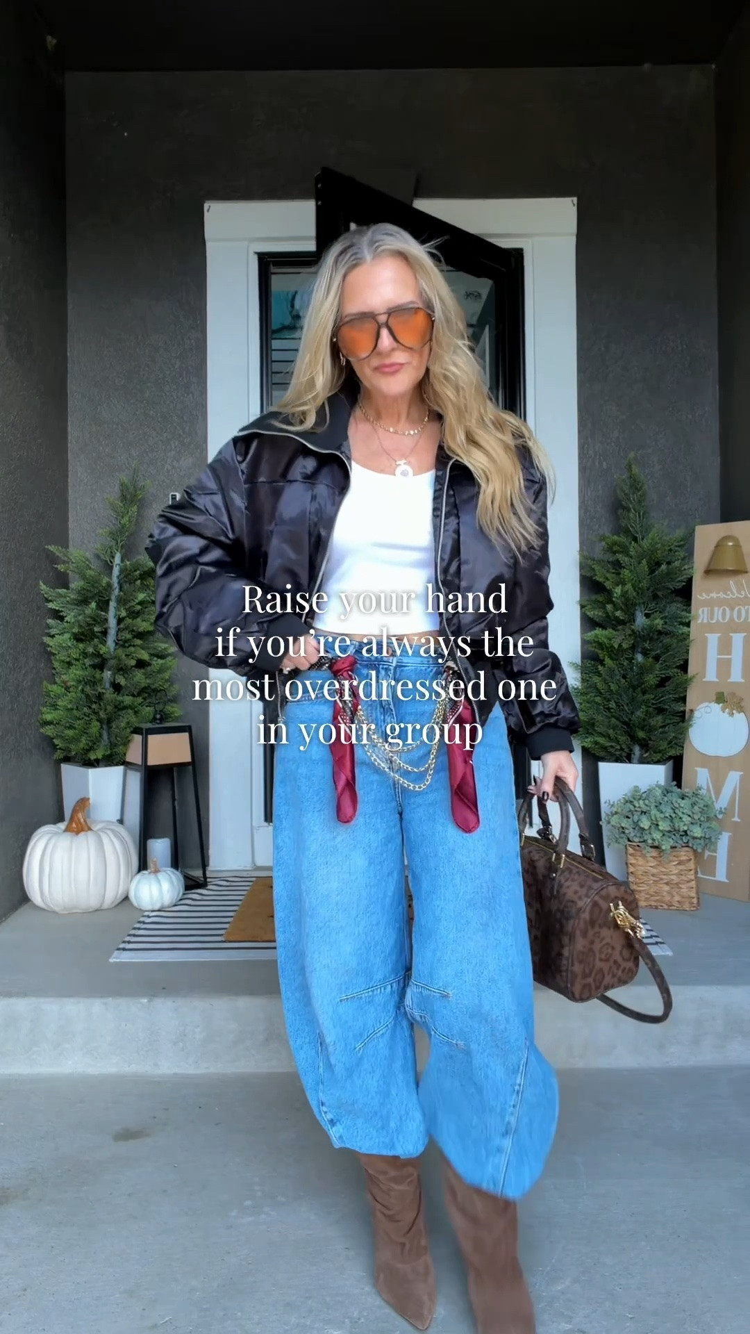 Elevated casual outfit with barrel jeans, boots, and a shiny black jacket, finished with a gold belt, scarf, statement sunglasses, and a great bag. I love starting with an easy jeans-and-boots outfit and letting the accessories do the work—it’s an effortless way to make everyday style feel a little more fashion-forward. 

 #LTKootd #LTKOver40 #LTKPetite