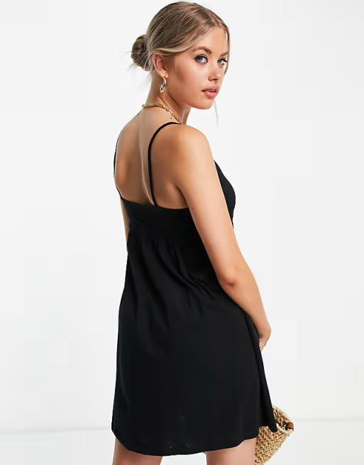 ASOS DESIGN Tall strappy babydoll mini sundress in black | ASOS (Global)