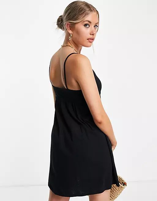 ASOS DESIGN Tall strappy babydoll mini sundress in black | ASOS (Global)