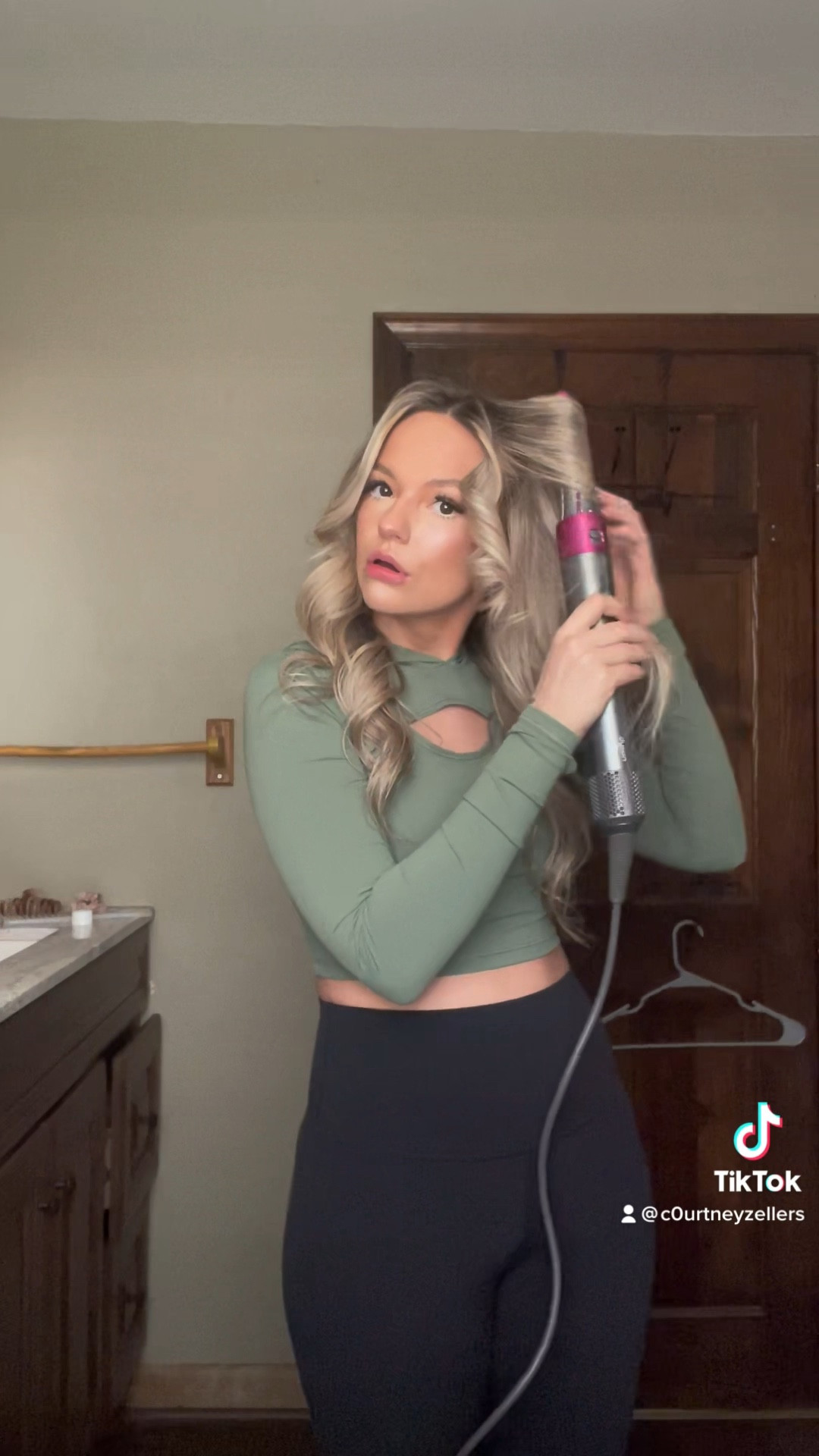 Feat the hanger in the background🤣 

But seriously cannot say enough good things about the dyson air wrap! It is my favorite hair tool. I have seen so much growth in my hair too from cutting back from direct ceramic heat. 🤍

#LTKfit #LTKbeauty #LTKunder100