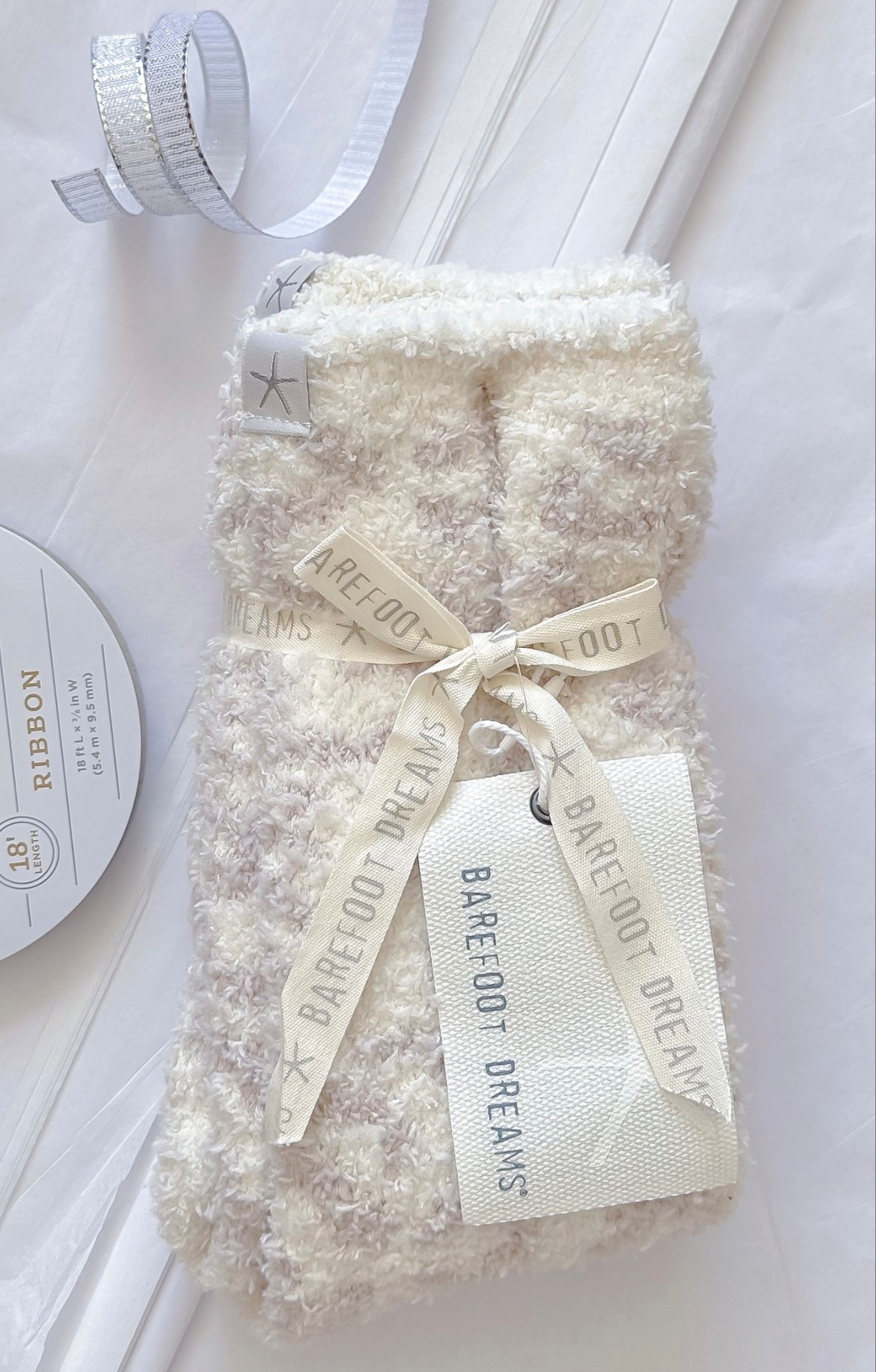 Great stocking stuffer - small gift! Gift to yourself! Fuzzy cozy Barefoot Dreams Socks! 

If you need ribbon I’m loving this silver/white one from Target that I got to match another gift

Gifts for Her. Christmas Gift  

#LTKGiftGuide #LTKHoliday #LTKSeasonal