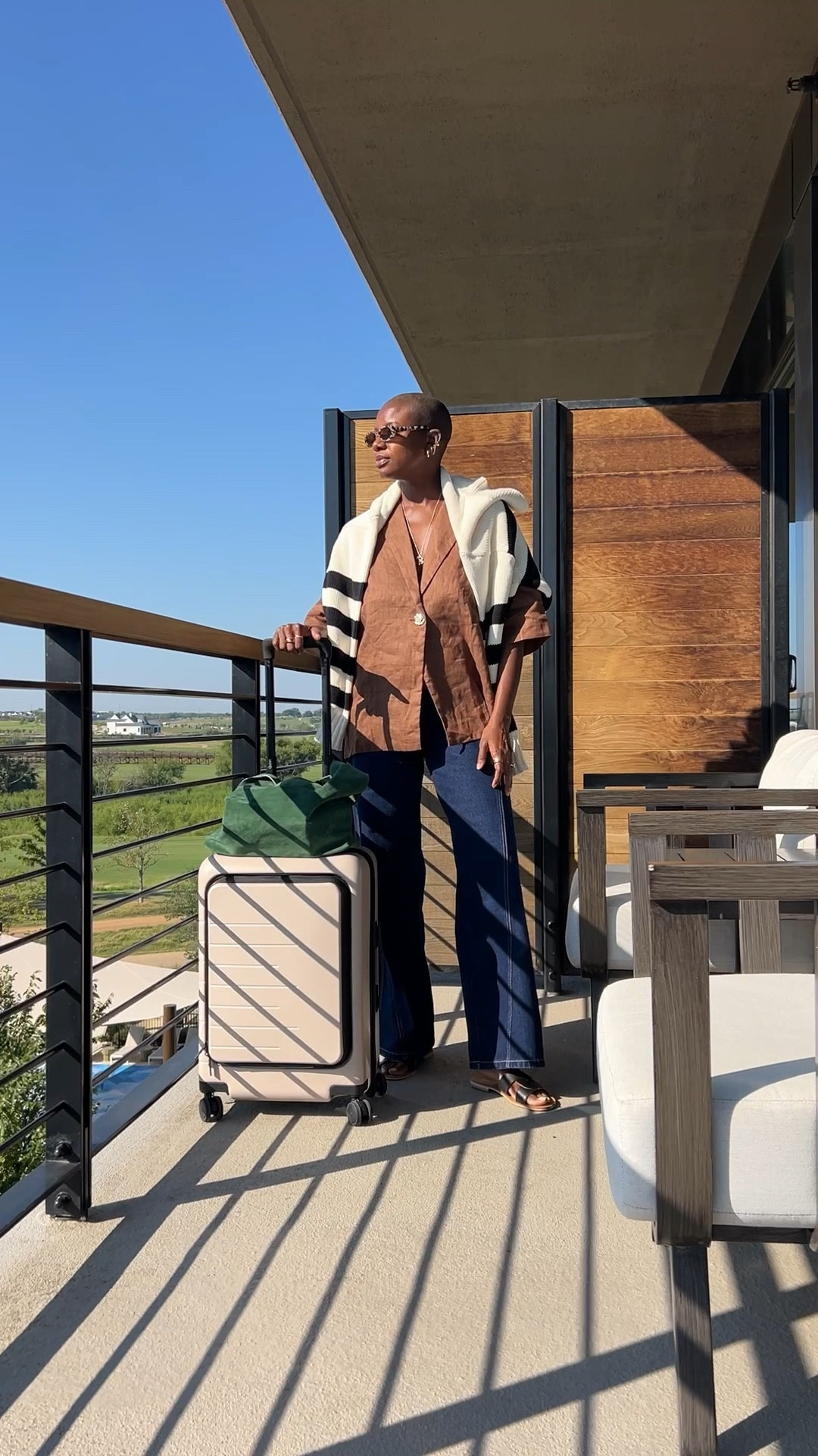 Casual elevated travel look and my favorite new luggage from Quince! The bag rolls so smoothly and has a great handle height. My top is has an oversized fit (I’m wearing a 4), my jeans are a 4 but I would size up for more room. The length is perfect though  

#LTKTravel #LTKCon #LTKFindsUnder100