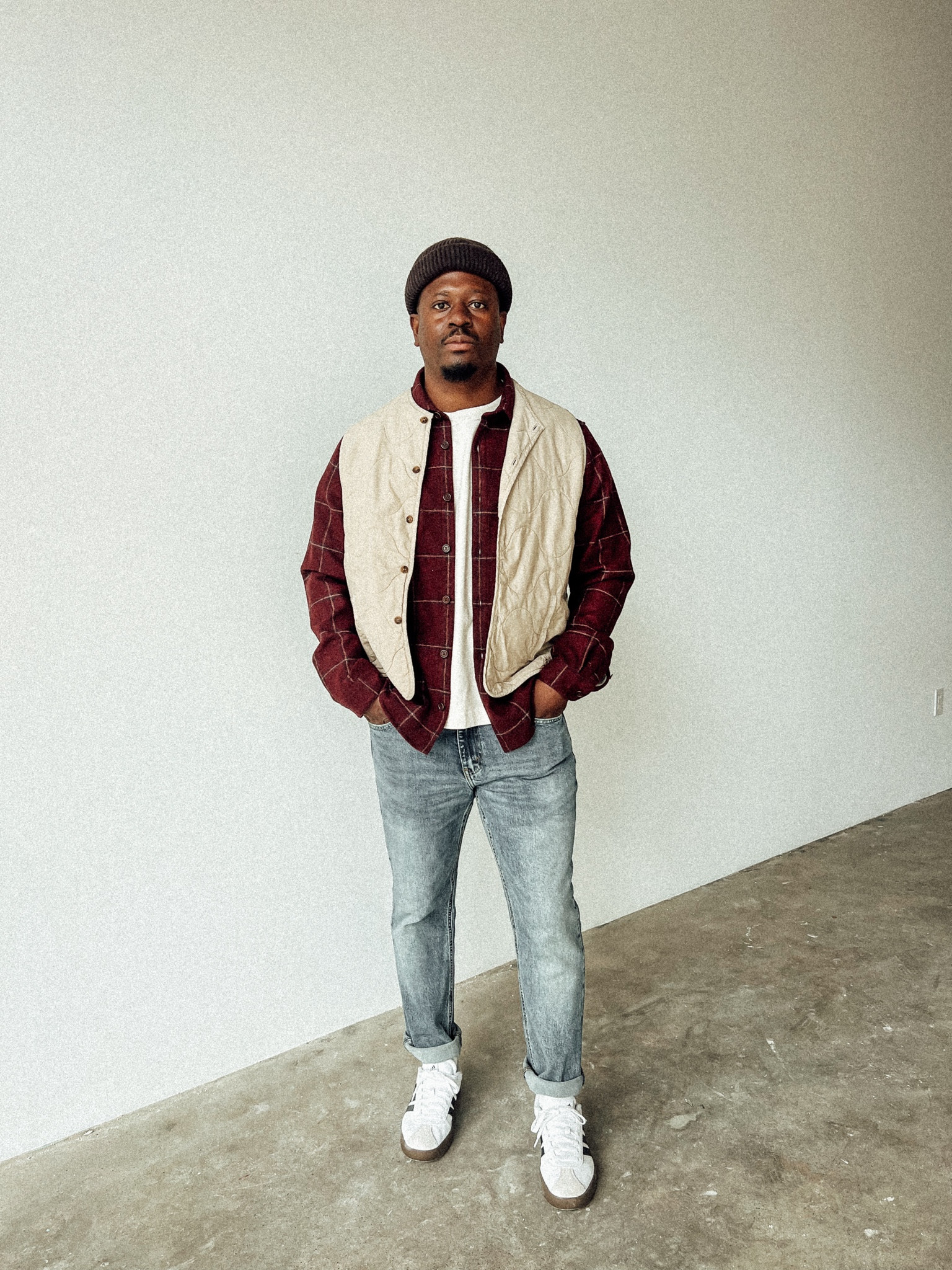 Brown vest paired with light wash blue jeans and white adidas sneakers

#LTKmens #LTKshoecrush #LTKworkwear