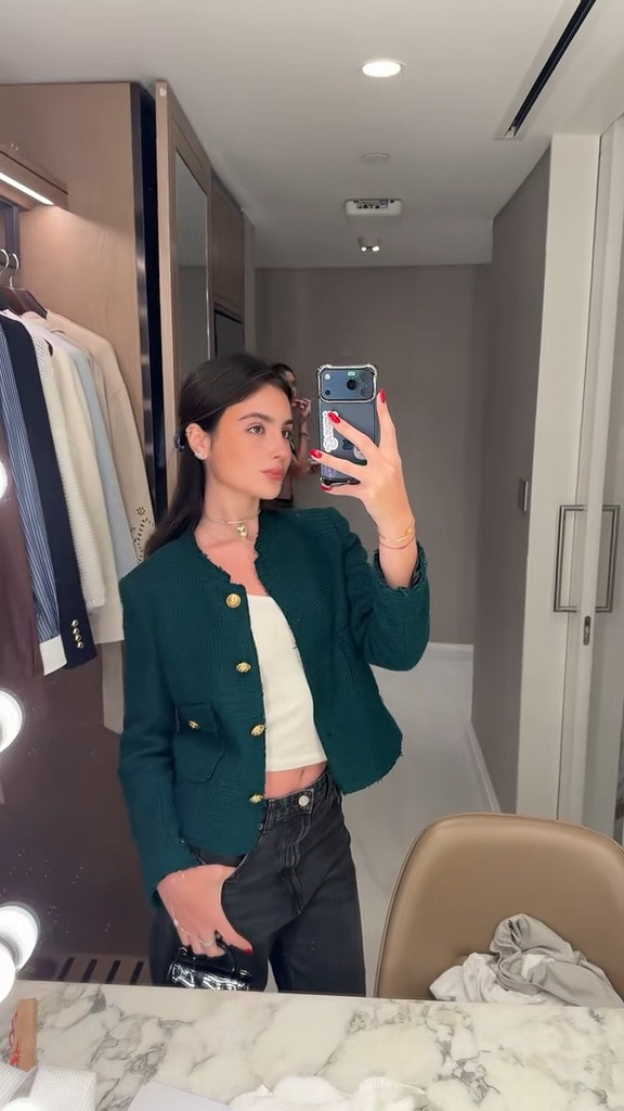 Emerald green and black will always look so chic 💚 Styling a gold-button jacket with an ivory tank, black wide-leg jeans and a mini bag. Exact jeans and similar jacket and tank options linked!

#LTKootd #LTKSeasonal #LTKdayinmylife