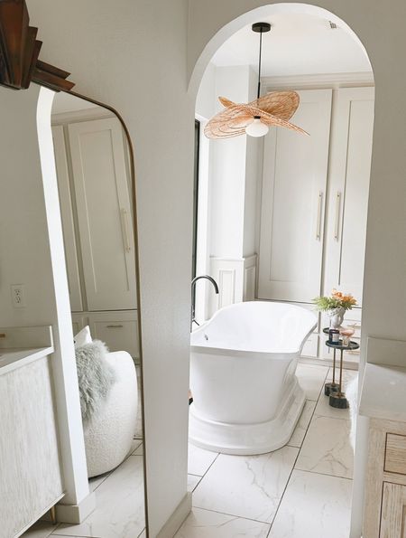 Primary bathroom large mirror modern tub paint color walls: pure white; trim agreeable gray 

#LTKStyleTip #LTKHome