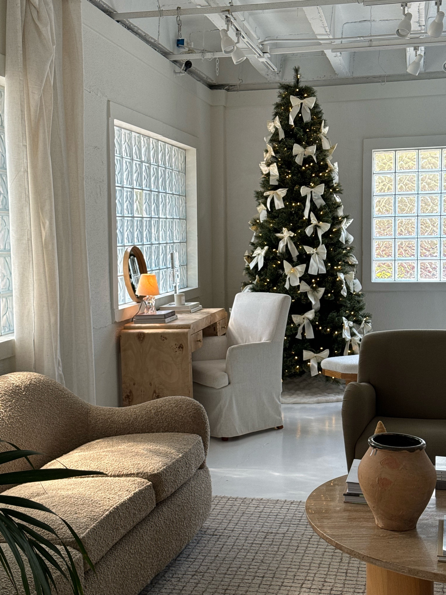 Christmas Decor: 9ft pre lit Christmas tree, satin Christmas bows, sofa, rug, accent chair 

#LTKStyleTip #LTKHoliday #LTKHome