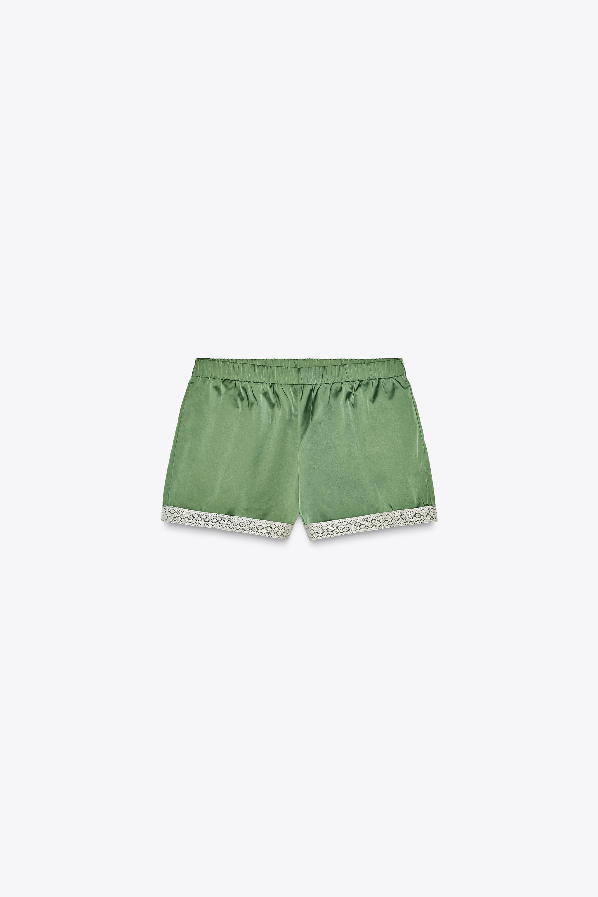 Satin shorts. Mid-rise and elastic waistband. Side pockets and back patch pockets. Contrast lace ... | Zara US