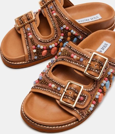 Spring summer slides 
Sandals 

#LTKSeasonal #LTKtravel #LTKswim