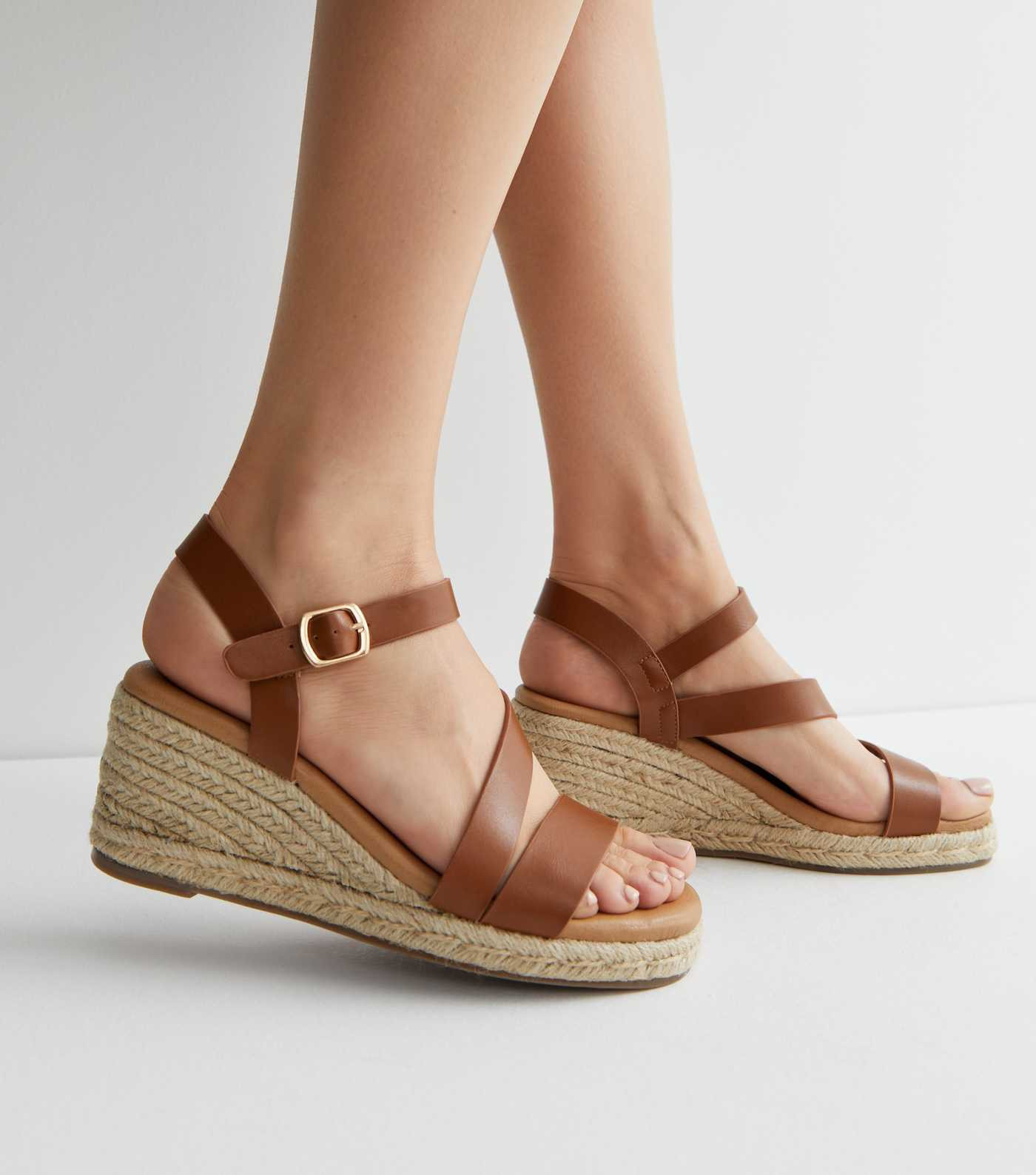 Tan Strappy Footbed Espadrille Wedge Heel Sandals
						
						Add to Saved Items
						Remove fr... | New Look (UK)