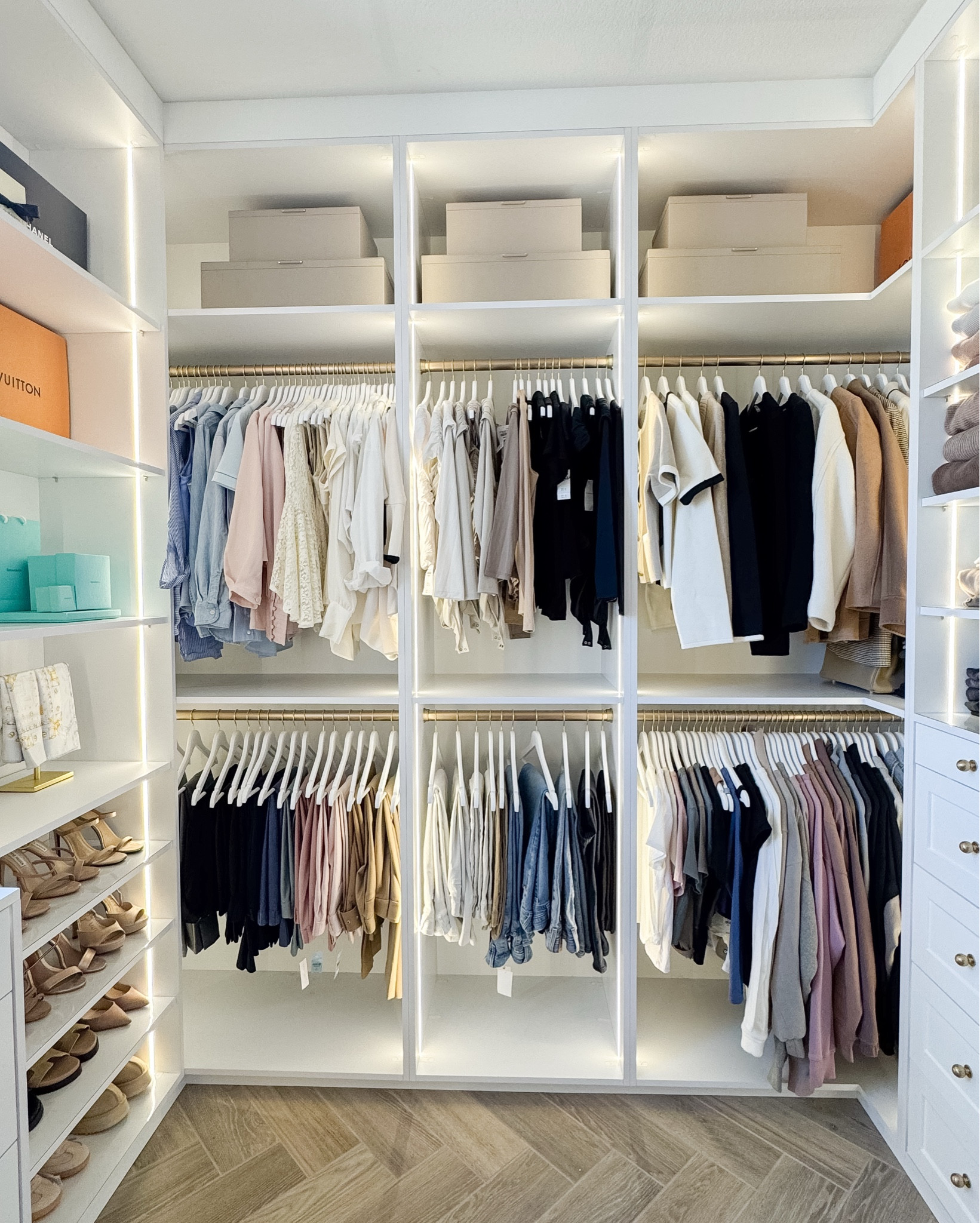 I was looking for some decorative storage boxes for the top shelf and love these ones! I love the look of the smaller box stacked on top of a larger box. It looks so much more elevated than just one taller box. These happened to be the perfect fit for the space and hold items like memorabilia, maternity clothes, and wedding keepsakes. 