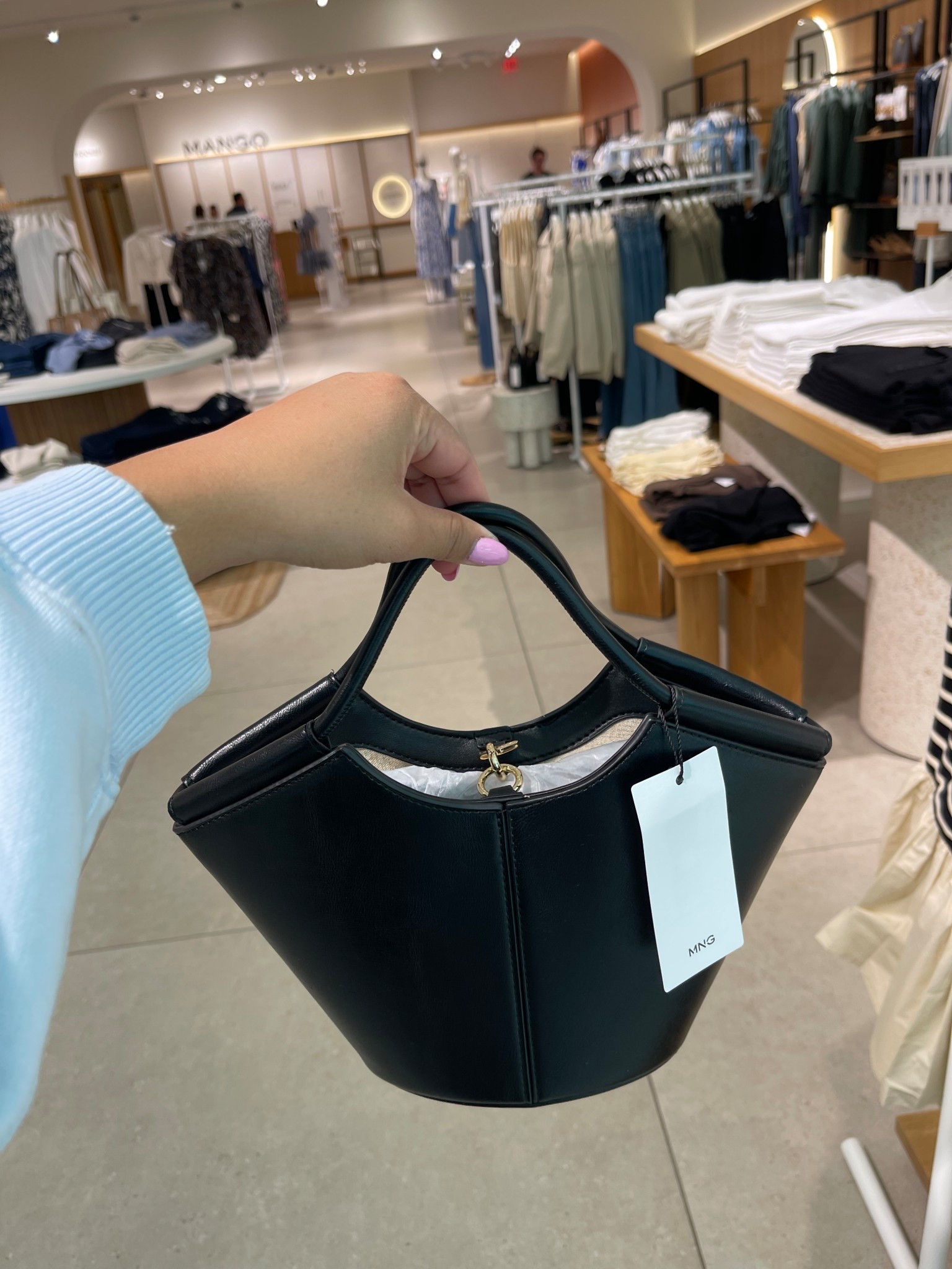 So cute and chic! 

black handbag, black purse, small bag