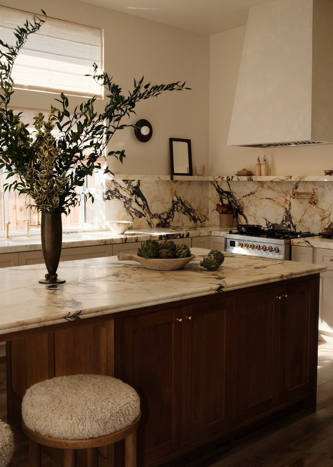 my kitchen 🤎

spotlights, wall sconces, range, hood insert, counter stools.
