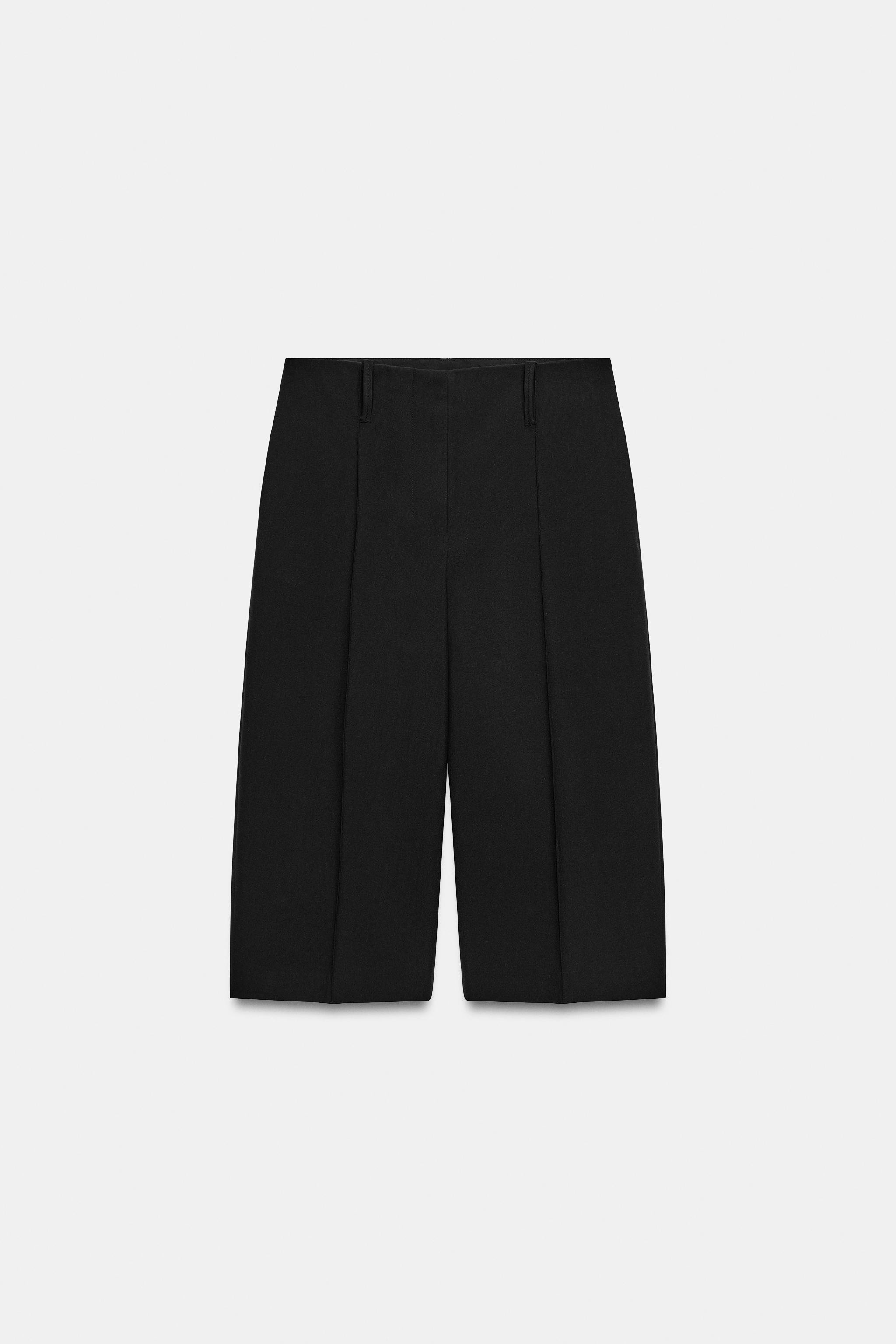 ZARA WOMAN COLLECTIONBermuda shorts made from a viscose blend yarn. Mid-waist with belt loops. Si... | Zara UK