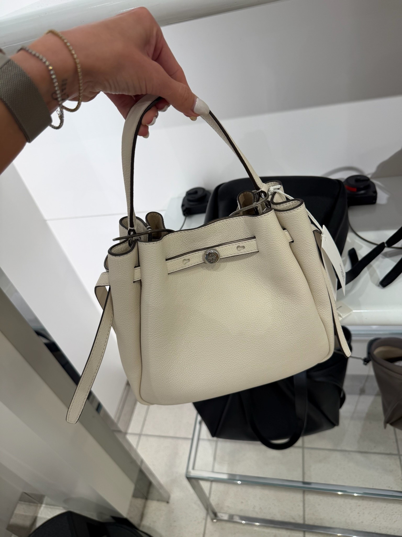 This bag has that timeless, wear-with-everything look I always gravitate toward. The pebbled leather feels incredibly luxe, it has both top handles and a crossbody strap, and the soft ivory color goes with everything from denim to dresses.

handbag, ivory bag, leather handbag, crossbody bag, everyday purse, neutral accessories, classic style, designer inspired, elevated essentials, capsule wardrobe, annabrstyle

#LTKootd #LTKOver40 #LTKTravel