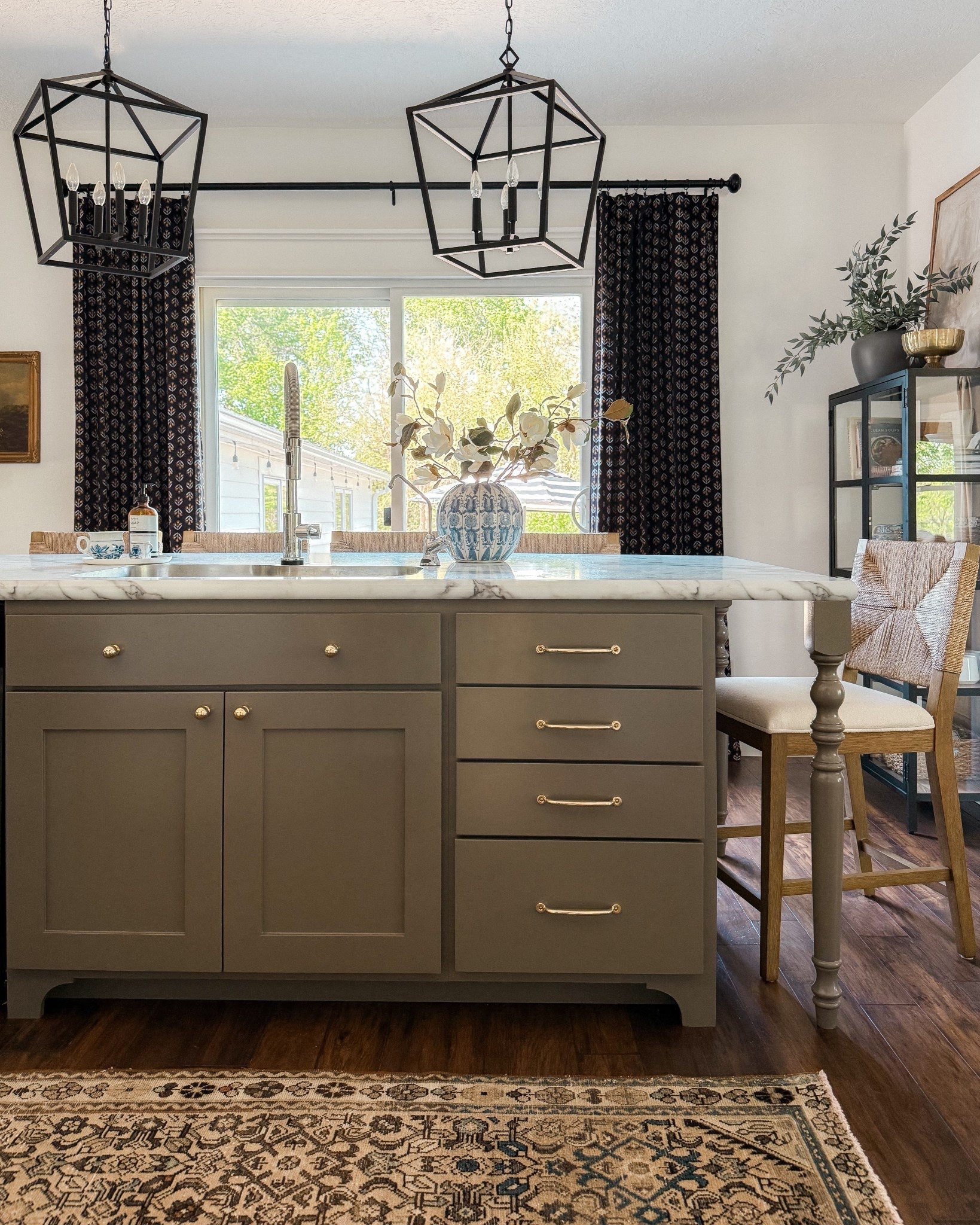 Our kitchen Island is finished and I am in love 😍 
This beautiful color and the addition of the decorative legs has me staring and I can’t wait to see what you guys think! 

Everything is linked below (the rug and vase are thrifted🥴) but I linked a similar vase I also have and love! 

#kitchenisland #kitchen #decor #homedecor #home #styletips #style 

#LTKFamily #LTKU #LTKHome