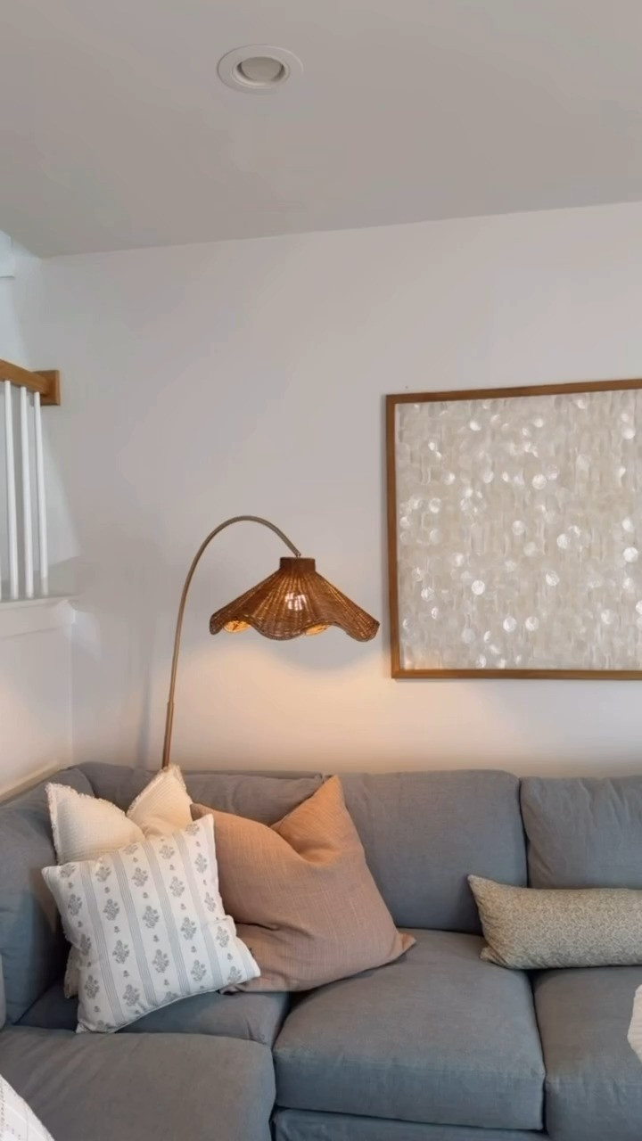 How cute is this floor lamp?! I was really wanting some more soft lighting in the living room, but there isn't much room for tables to put them on! I thought this floor lamp with the arch would be perfect at the corner of the sectional, and I love how it turned out! @wayfair #ad #wayfair #wayfairpartner 

Loverly Grey, wayfair, living room inspo, furniture, rattan lamp, beach house 

 #LTKHome