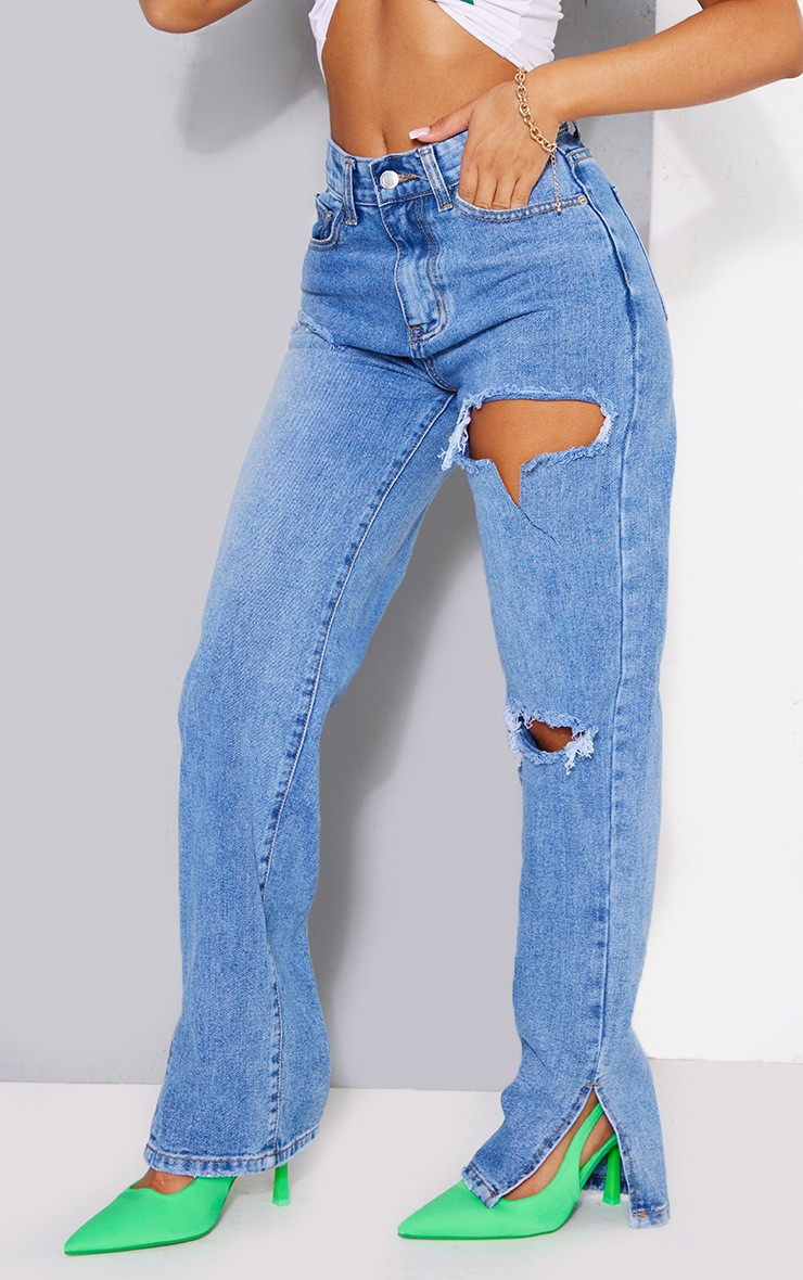 Petite Mid Blue Wash Ripped Split Hem Jeans | PrettyLittleThing US