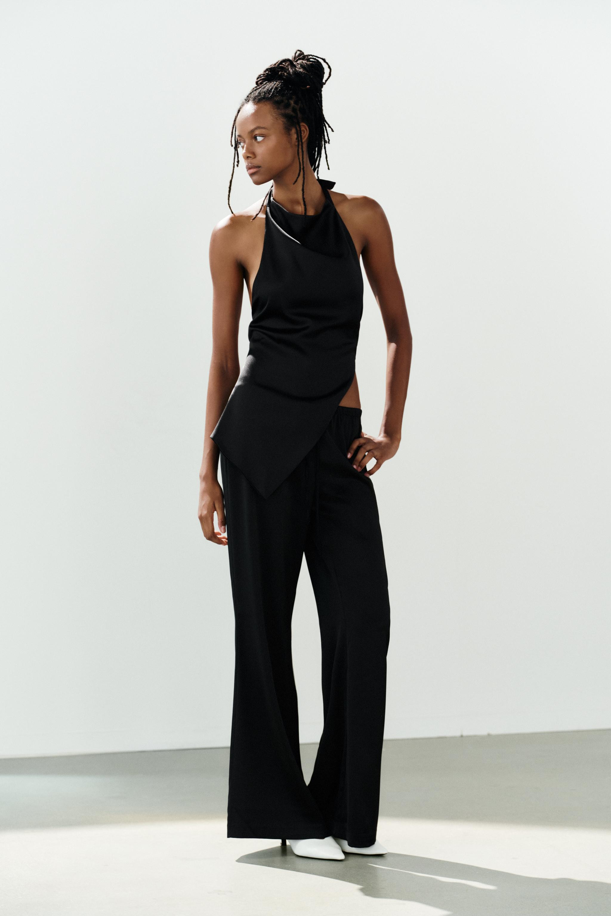 Mid-waist trousers with an adjustable drawstring waistband. Wide-leg design. | Zara DE