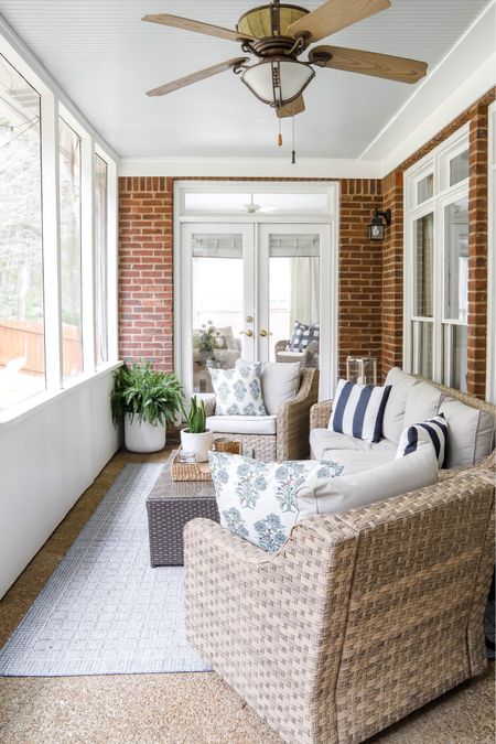 Our back porch furniture is still available in a darker weave. The chairs are swivel gliders. The couch is stationary and comfortable. We added the rug recently and love it. It matches our light blue ceiling. 

#LTKhome