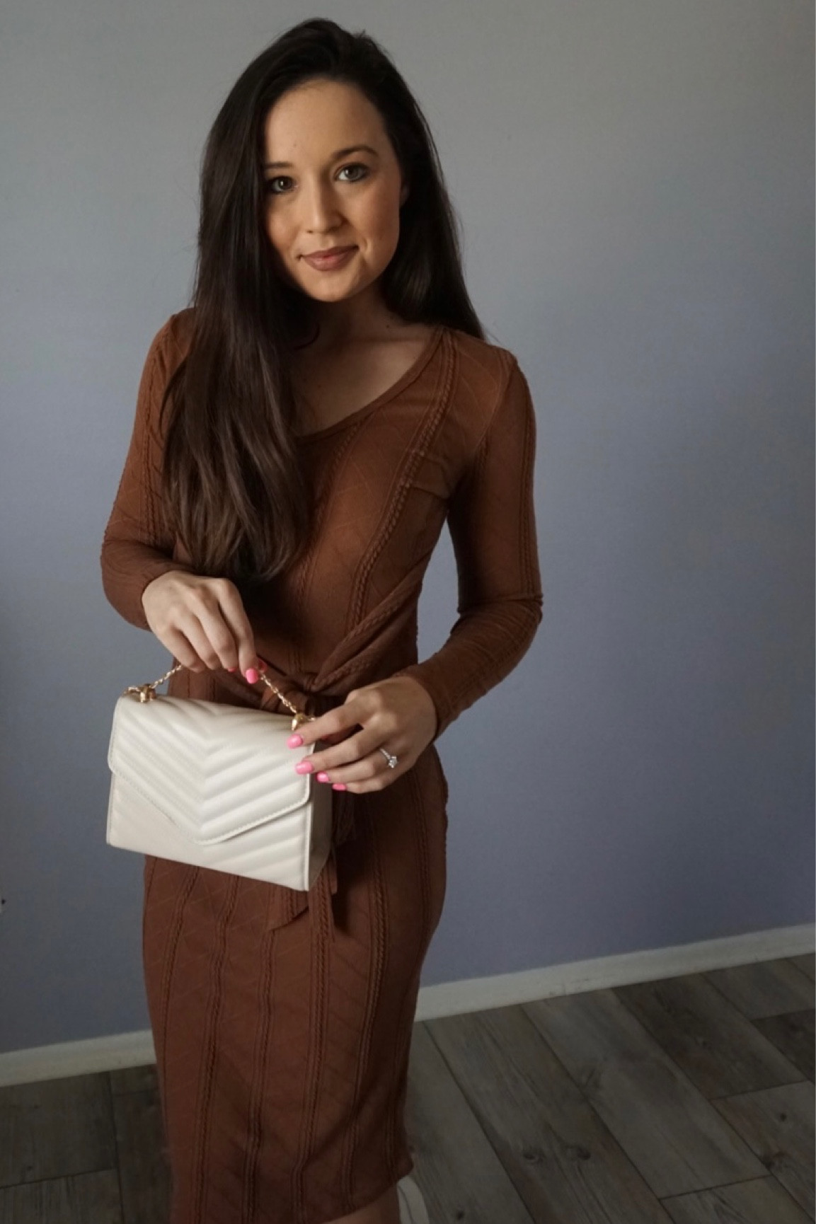 Brown long sleeve sweater dress and small crossbody bag 

#LTKSeasonal #LTKHoliday #LTKCyberweek