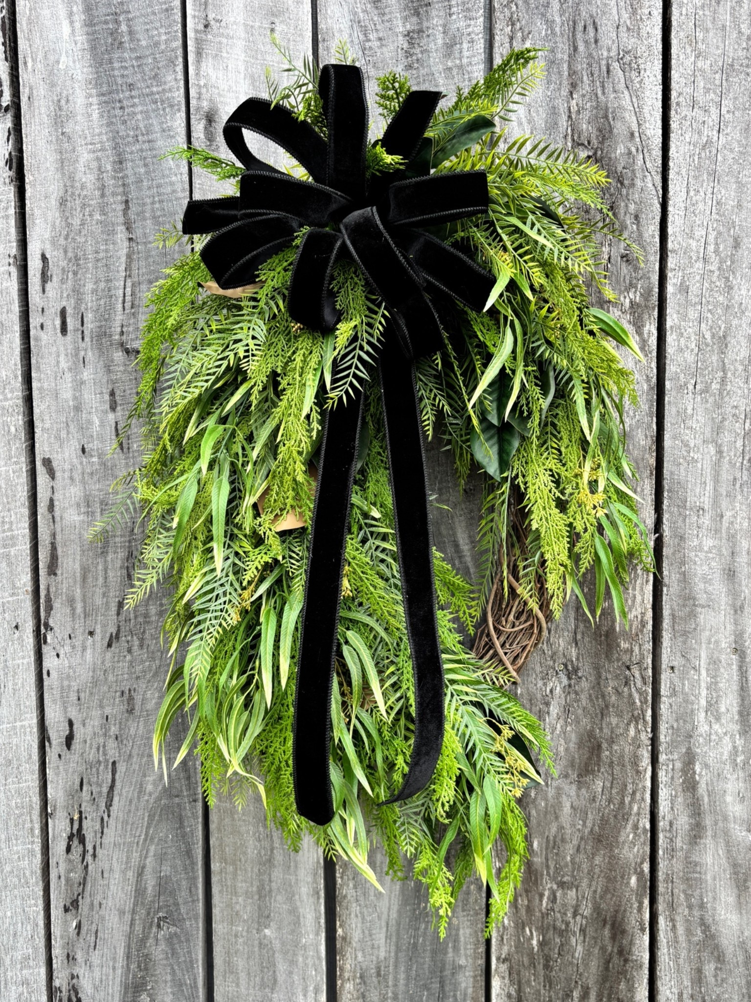 🎄 Christmas in July starts today! 🎄

We’re kicking things off with this timeless natural wreath featuring magnolia leaves, cedar, fern, eucalyptus, and a gorgeous black velvet bow. It’s the perfect way to bring elegant winter charm to your front door.

#LTKSeasonal #LTKHome #LTKU