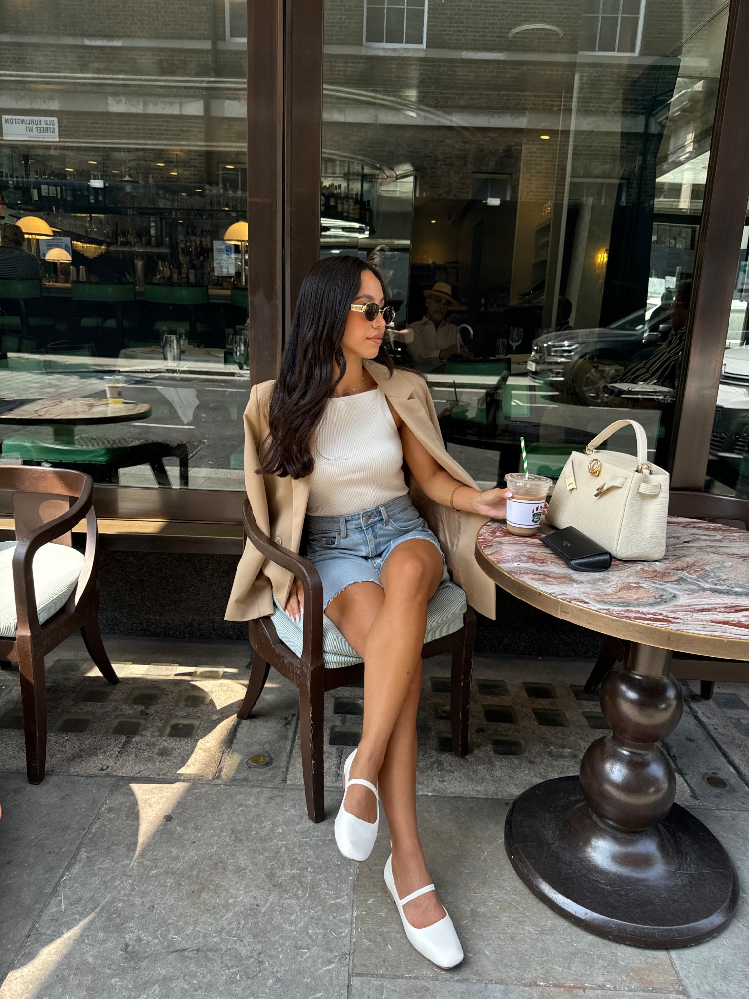 Spring/ summer in the city outfit 🤍🌤️ denim shorts, a simple vest, beige blazer and Mary Jane sandals 

#LTKeurope #LTKsummer #LTKspring
