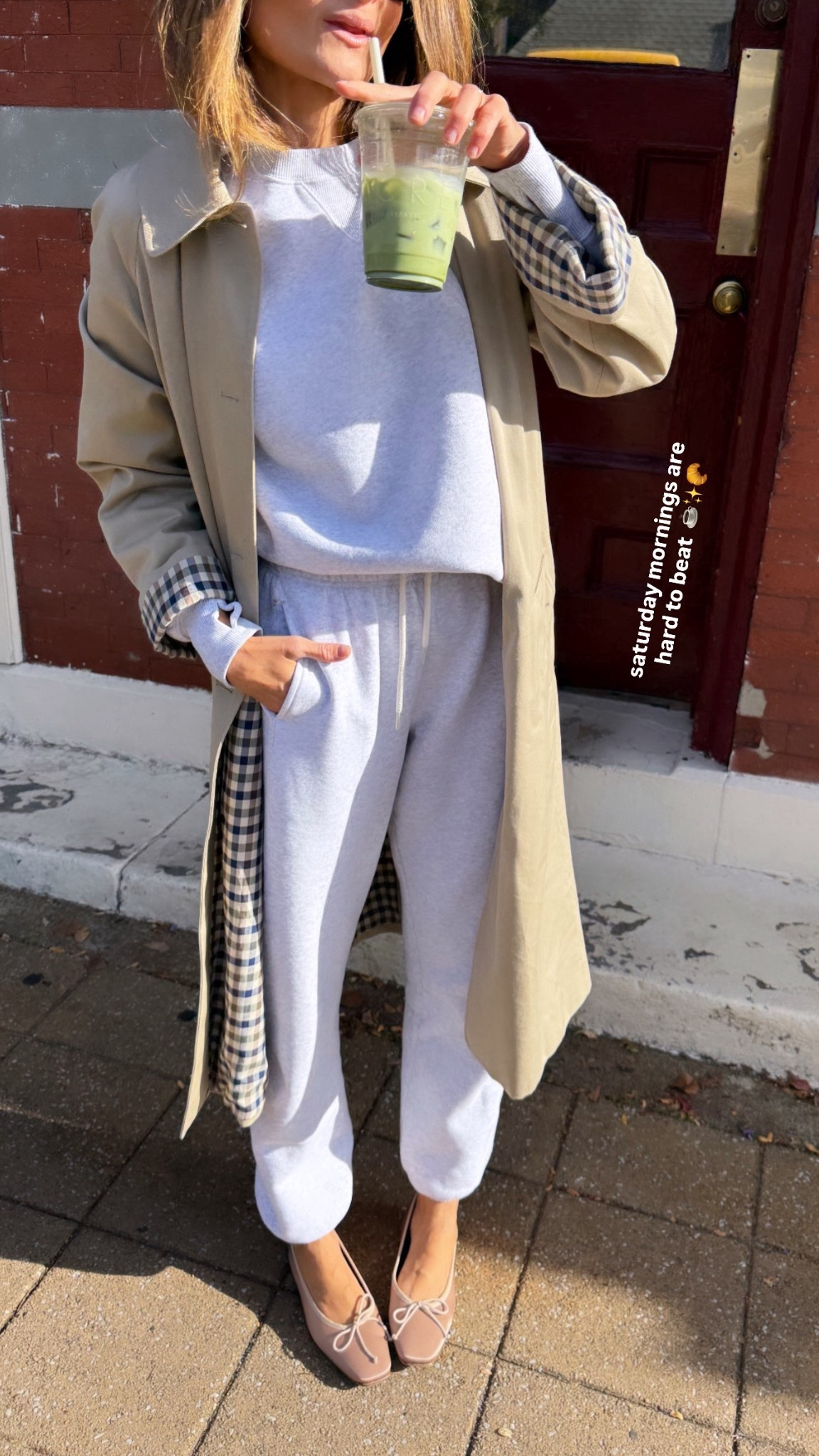 A street view of my Saturday OOTD so you can see what she looks like in the wild 😀

OFFLINE by Aerie oversized Cloud Fleece Crew Neck is the softest for weekend coffee runs. So warm and cozy. Matching sweats to complete the look. Living in these all Fall long. Love the subtle details near the ankle and draw string. • Sezane Clyde Coat is the star of this show with the classic silhouette and beautiful patterned liner. Outerwear is so important in Fall. It’s the first thing people see and ties the whole outfit together. This coat sells out a lot so grab it now! 
• Liffner Brown suede tote is my go to this Fall. Quintessential Fall staple is the only way to describe it. Definitely an investment but I’m getting so many miles out of it, I’d say it’s 100% worth it • Margaux punk Satin shoes such a fun surprise to make this outfit just a bit more fun. • Ray -Ban sunnies even more important in the Fall. Recommend transitioning from colored sunnies to black or tortoise. Have a great weekend y’all!!

Sizing notes:

Wearing a size small in top & bottom. Flats run tts, in a 37. Sized down 1 in the trench - I’m in the “light beige” color way. 

#LTKStyleTip #LTKActive #LTKSeasonal
