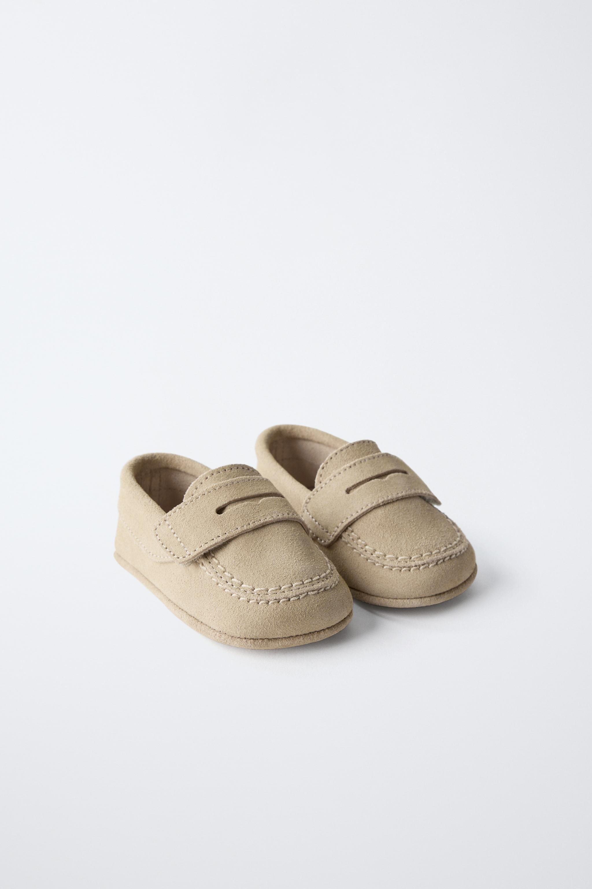 Moccasin-style booties, 100% cowhide leather. Flexible insole, 100% goatskin leather. Outsole, 10... | Zara US