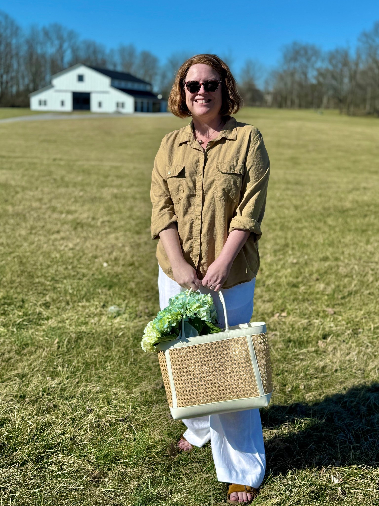 I keep reaching for this shirt. So much so, I’ve ordered it in white and can’t wait for it to arrive. And…I’m thinking of getting it in the blue-stripe as well so I can live out my Nancy Meyer farmer’s market shopping dreams. I paired it today with these flowy pants and my new straw-look tote! 

The pants are an XL and the shirt is an XXL. I’m usually a 16/18 #springfashion #nancymeyers #inagarten #genxstyle #coastalgrandma #vacationoutfit

#LTKPlusSize #LTKItBag #LTKOver40