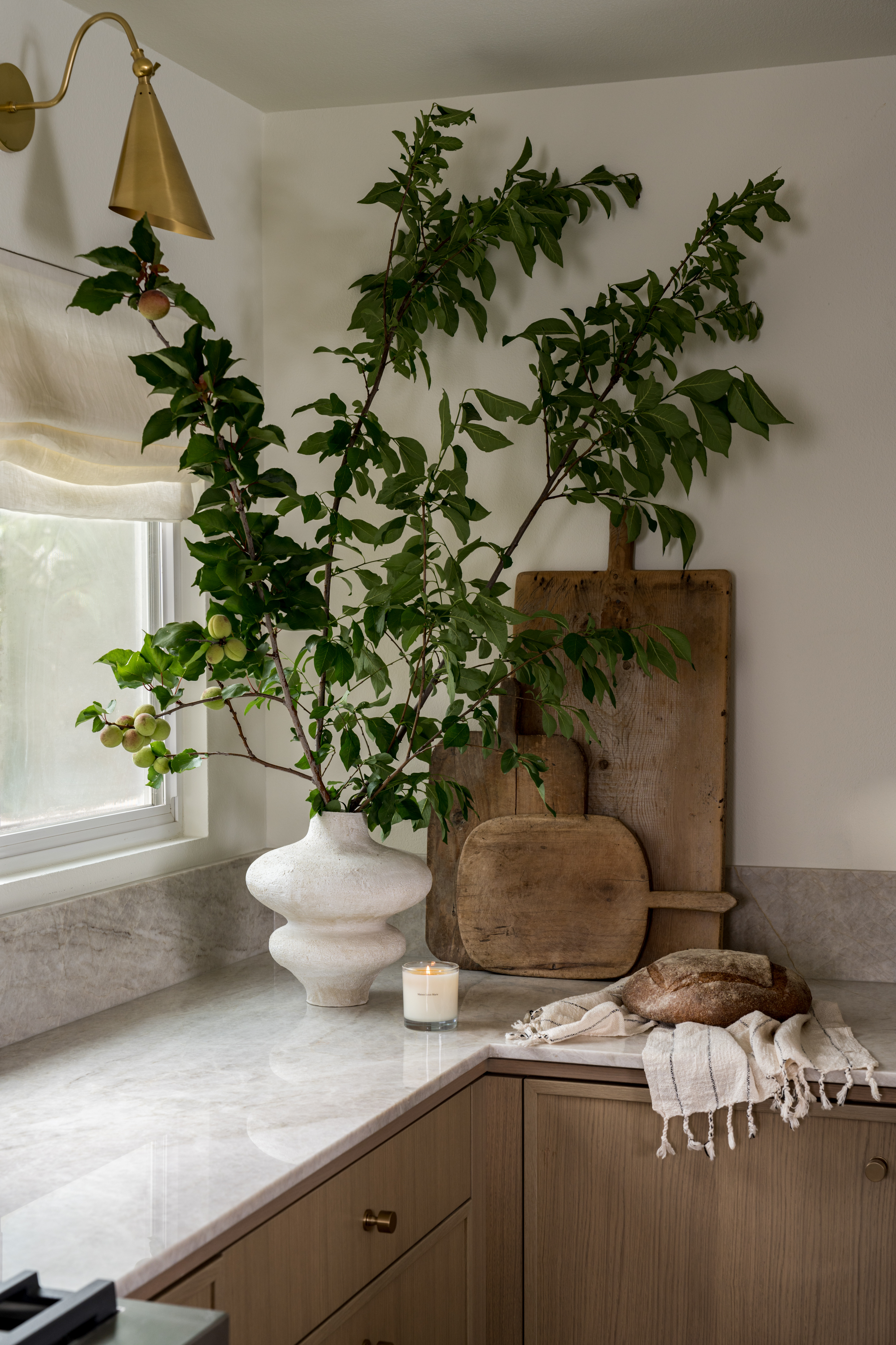Kitchen styling products to bring lived in organic modern touches: vintage bread boards, candle, kitchen towel, earthy vessel, linen shades, hand towel. 

#LTKHome #LTKStyleTip