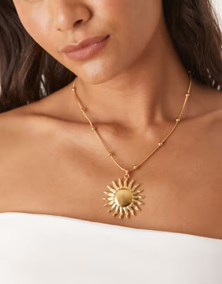 ASOS DESIGN waterproof stainless steel necklace with sun pendant in gold tone | ASOS | ASOS (Global)