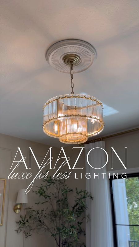 Luxe for less lighting as seen in my home from Amazon! Including this modern crystal chandelier, sculptural lamp, modern candelabra chandelier, wireless sconces and wireless lamp!

#LTKfindsunder50 #LTKsalealert #LTKhome