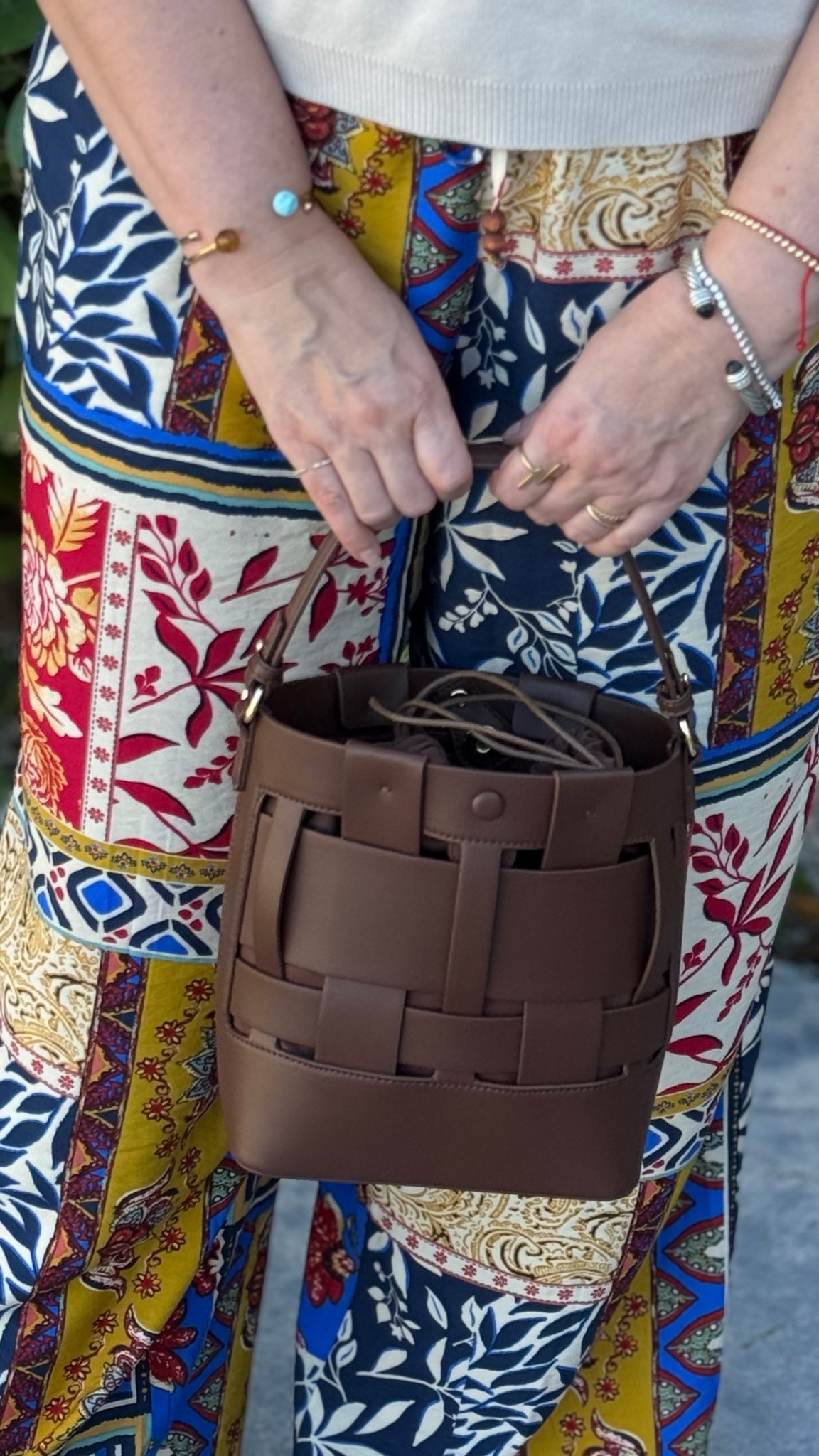 This brown bucket bag is my favorite for spring.  Small but spacious to fit everything you need and it’s a crossbody. 

#LTKOver40 #LTKMidsize #LTKootd