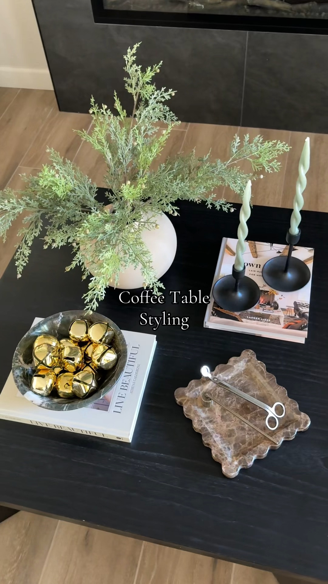 Coffee table styling inspo! Use this quadrant formula when styling a square coffee table. 
••
Coffee table, square coffee table, wood coffee table, black coffee table, black wood coffee table, square black coffee table, how to decorate coffee table, coffee table style, coffee table decor, coffee table decor Inspo, living room decor, living room styling, how to style coffee table, how to decorate coffee table 


#LTKWatchNow #LTKStyleTip #LTKHome