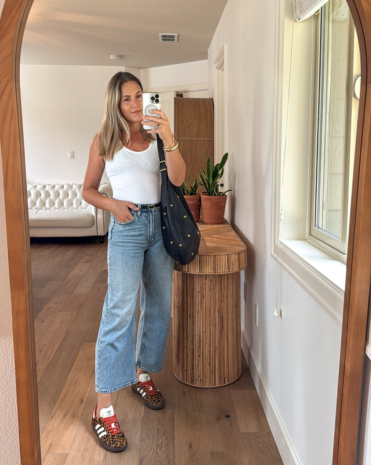 Today’s look 🖤❤️

Keeping my outfit basic with a white tank top and wide leg cropped jeans! Elevating it with my new cheetah print sambas and curved leather shoulder bag.

#LTKShoeCrush #LTKOver40 #LTKStyleTip