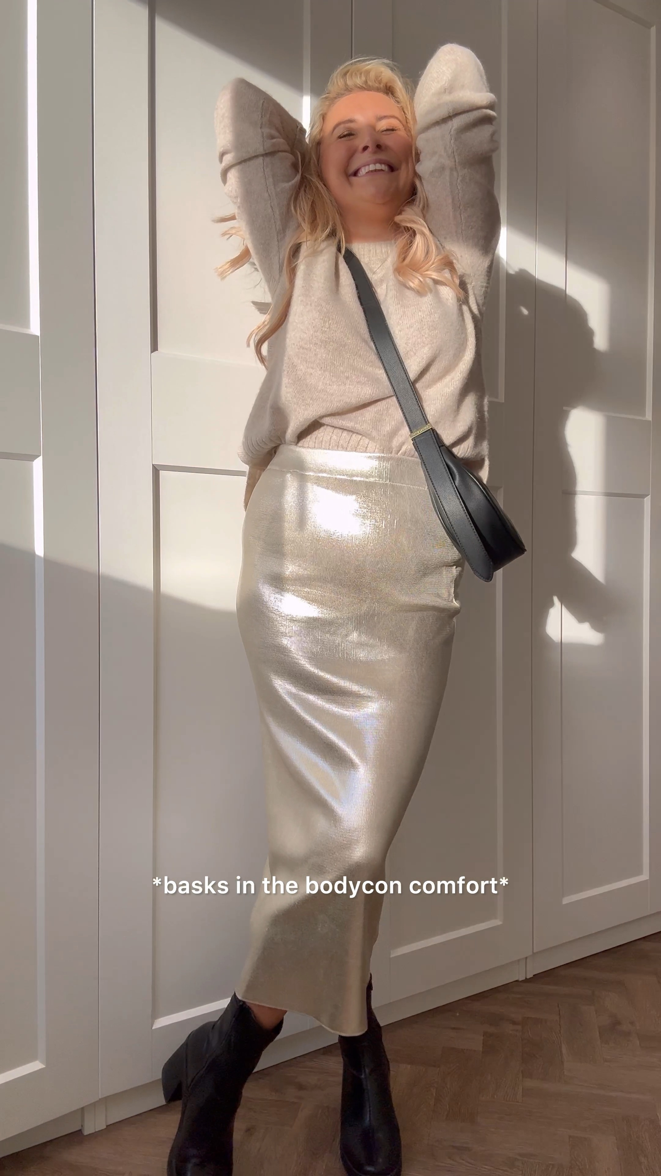 Knit jumper, sparkle bodycon maxi skirt, black boots, crossbody bag. Skirt is Zara 

#LTKSeasonal #LTKeurope #LTKstyletip