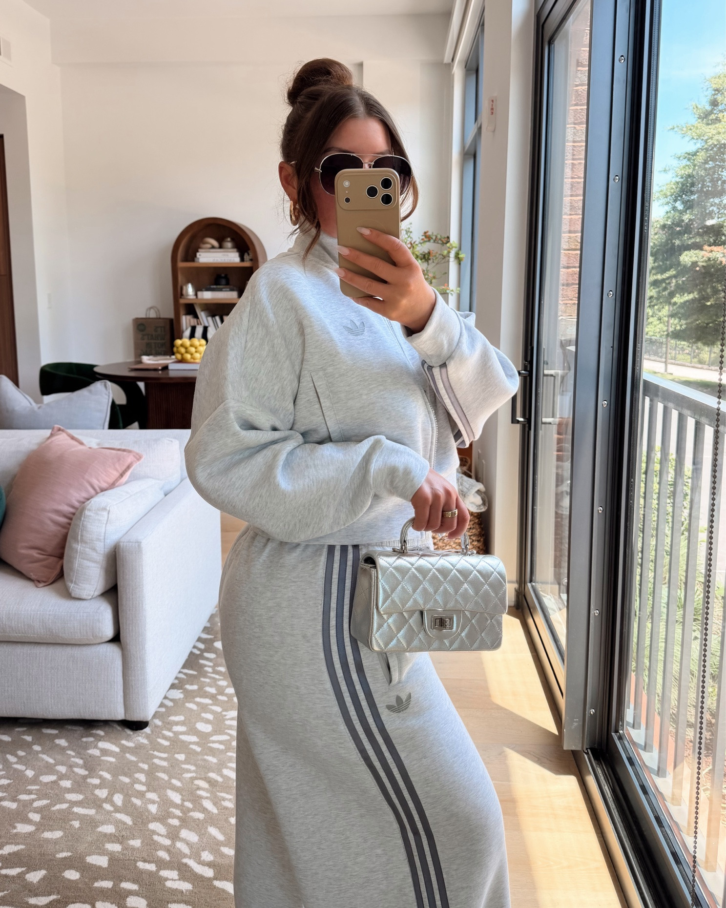 Adidas pant set runs true to size, it is made for an oversized fit.

Nike pleated swing dress is a nylon material, very light weight. Highly recommend wearing shorts underneath, one gust of wind will expose you. Runs tts.

#LTKootd #LTKActive #LTKSeasonal