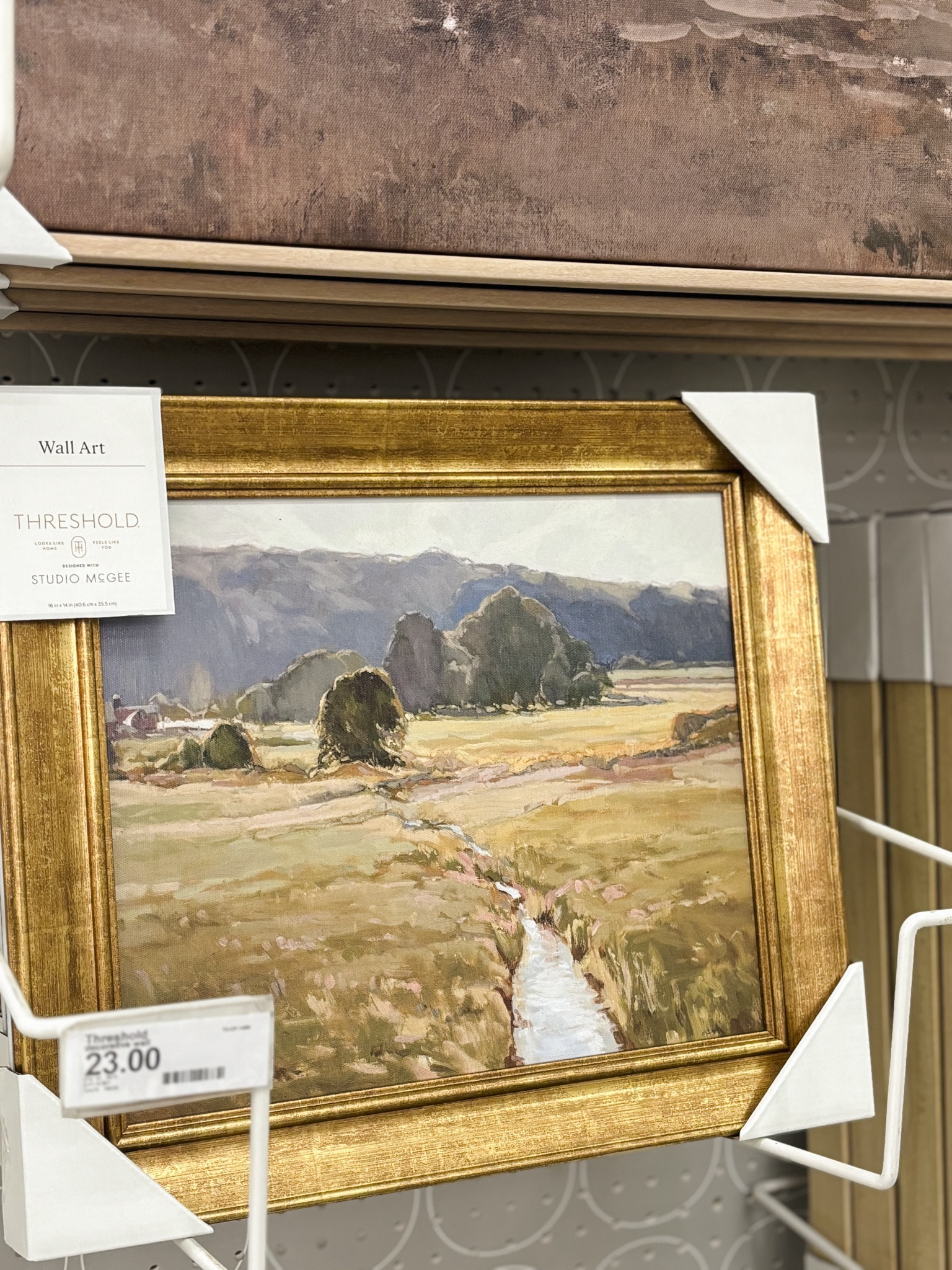 Landscape art in gold frame 

#LTKSeasonal #LTKHome #LTKStyleTip
